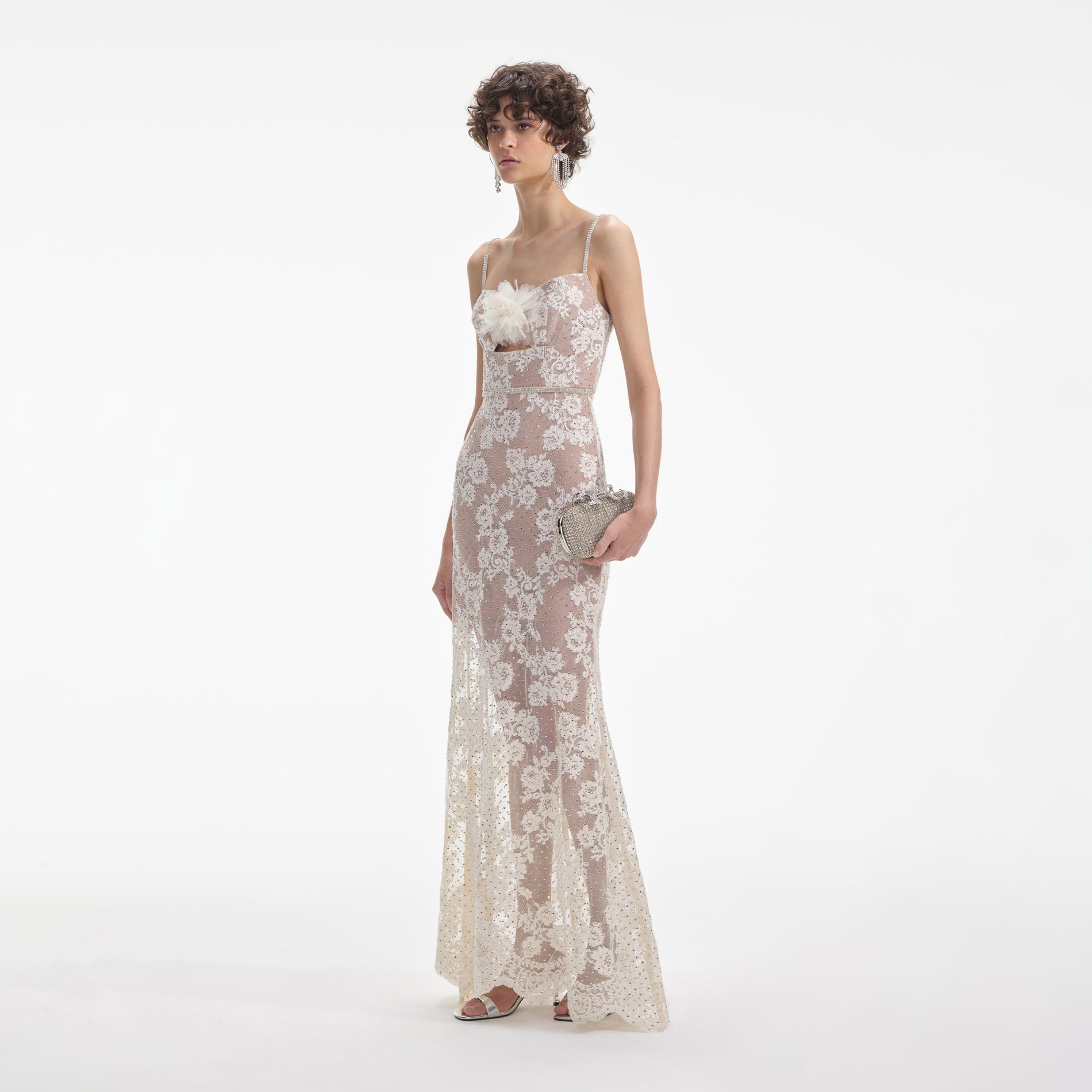 Side view of a woman wearing the Cream Rhinestone Lace Maxi Dress
