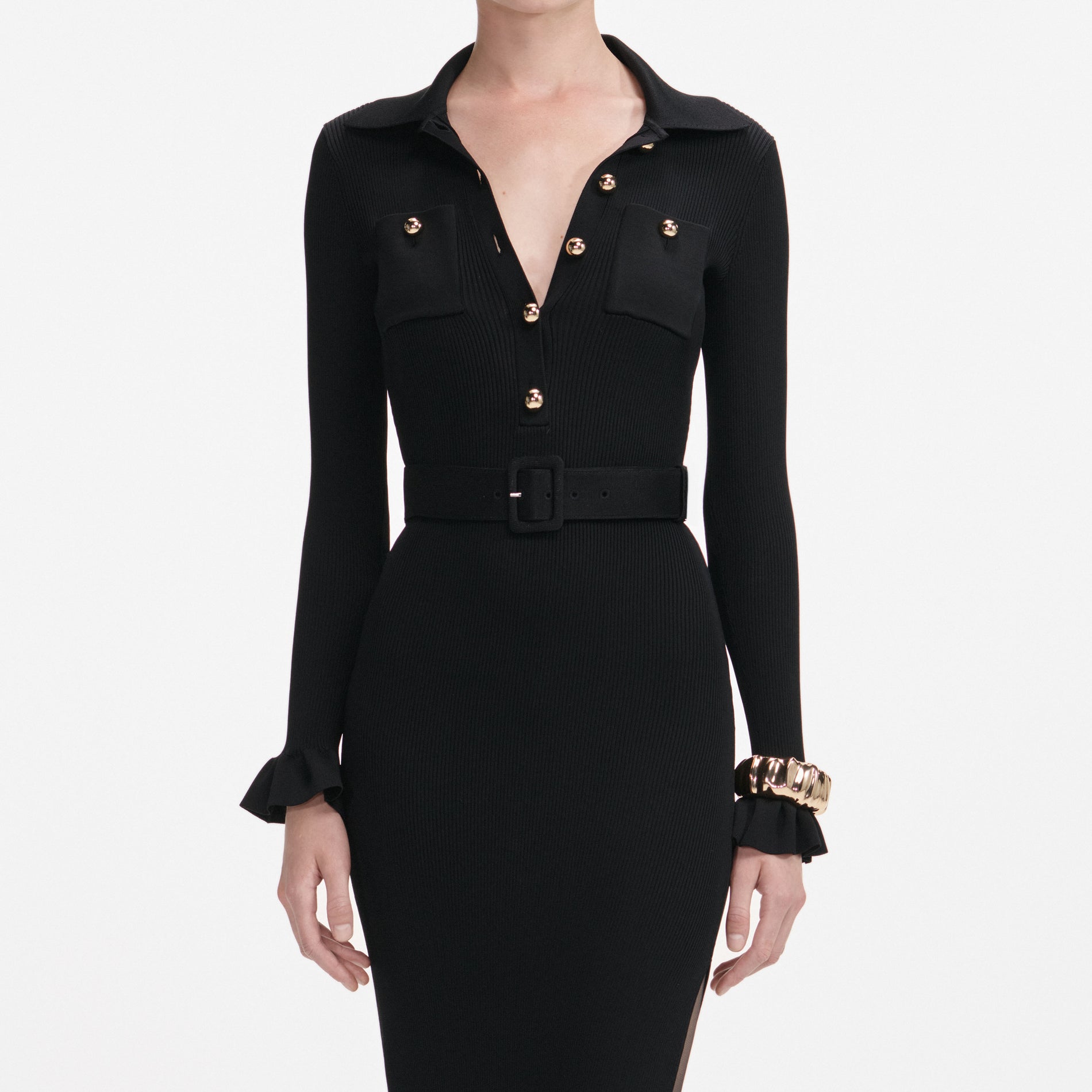 A close up of a woman wearing the Blue Crystal Trim Cardigan