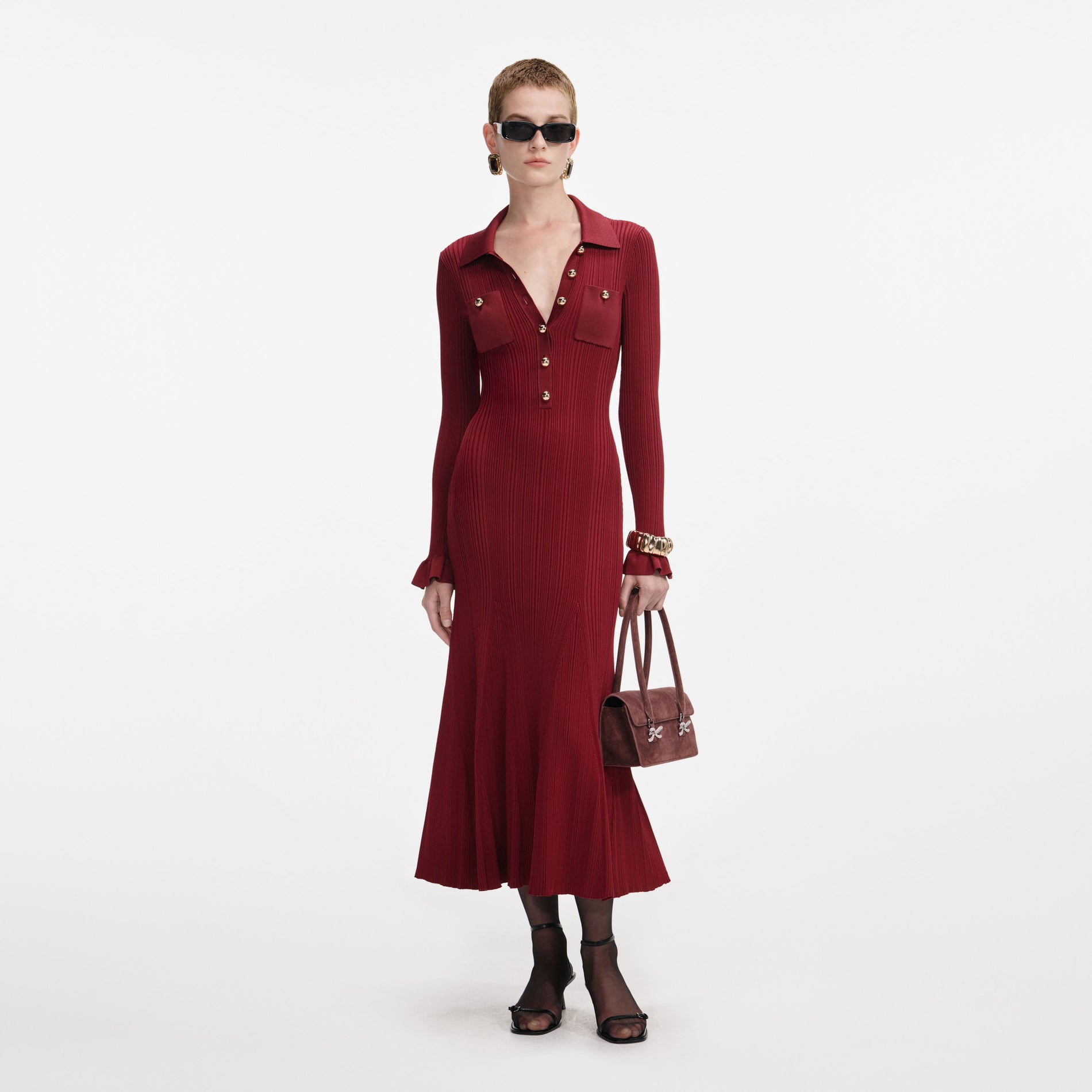 Front view of a woman wearing the Burgundy Ribbed Knit Midi Dress