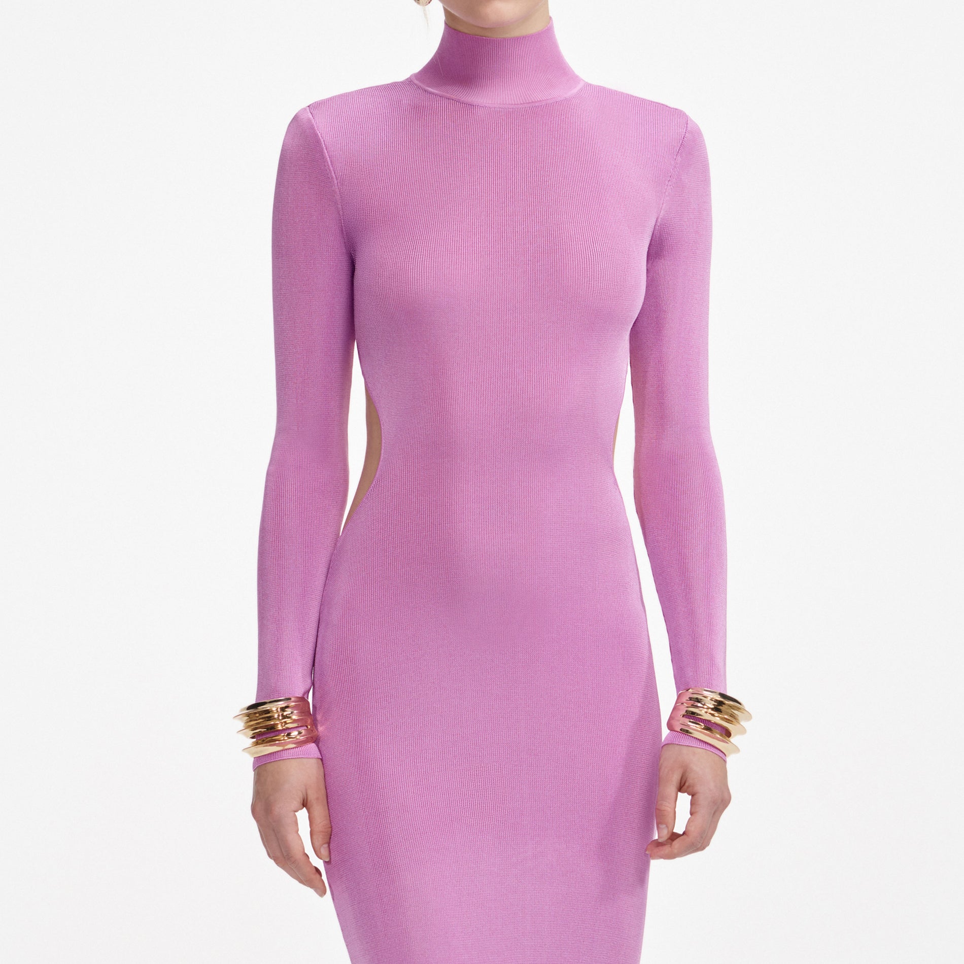 A close up of a woman wearing the Navy Pointelle Knit Trousers