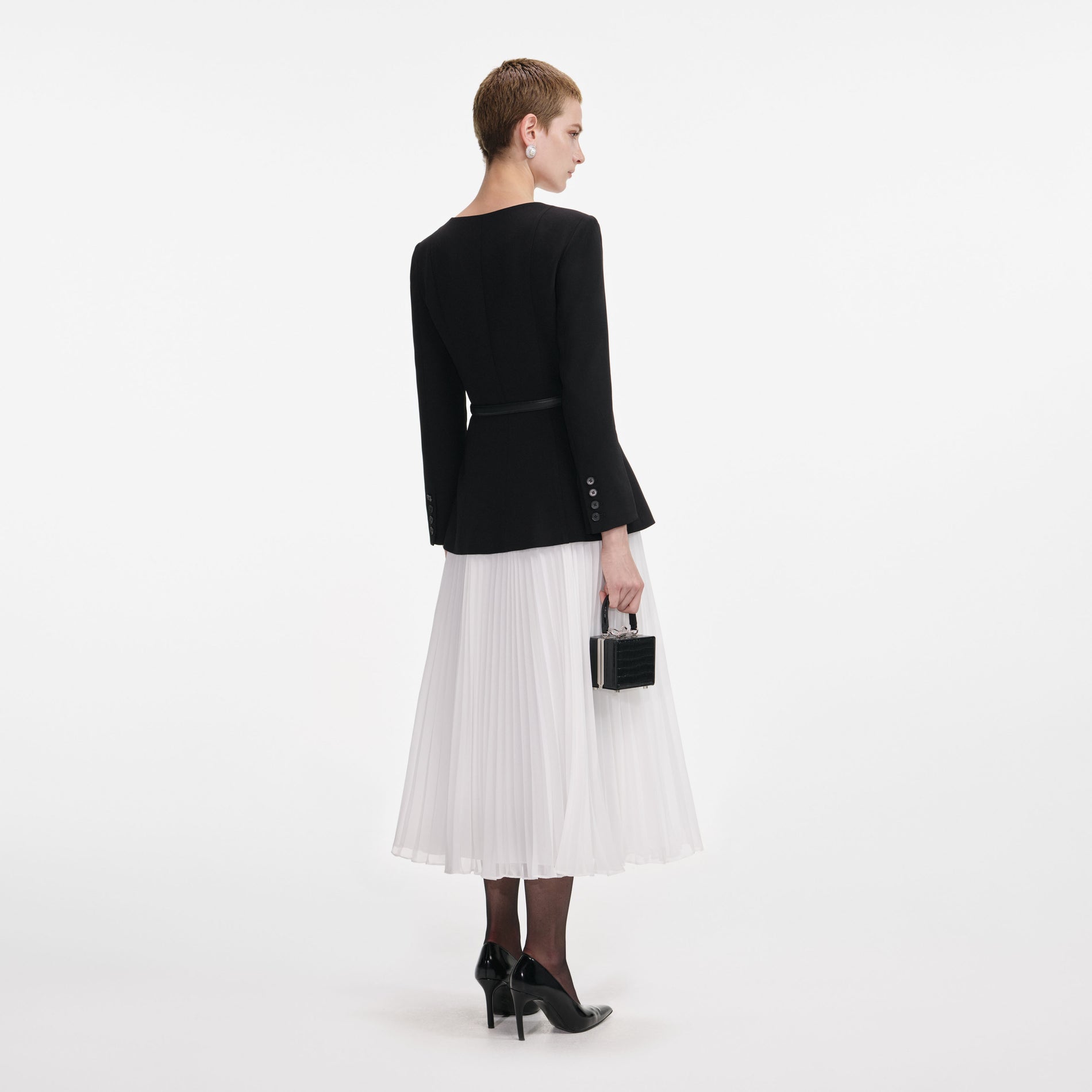 Back view of a woman wearing the Black Long Sleeve Contrast Chiffon Midi Dress