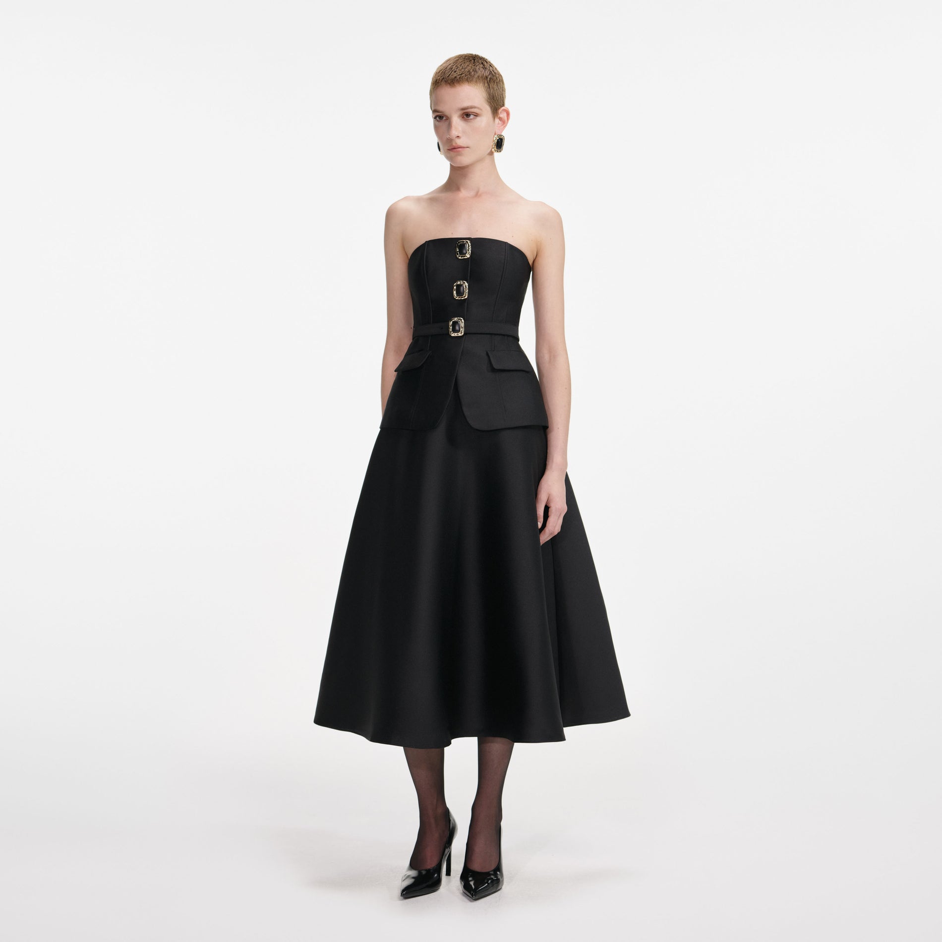 Side view of a woman wearing the Black Taffeta Bandeau Midi Dress