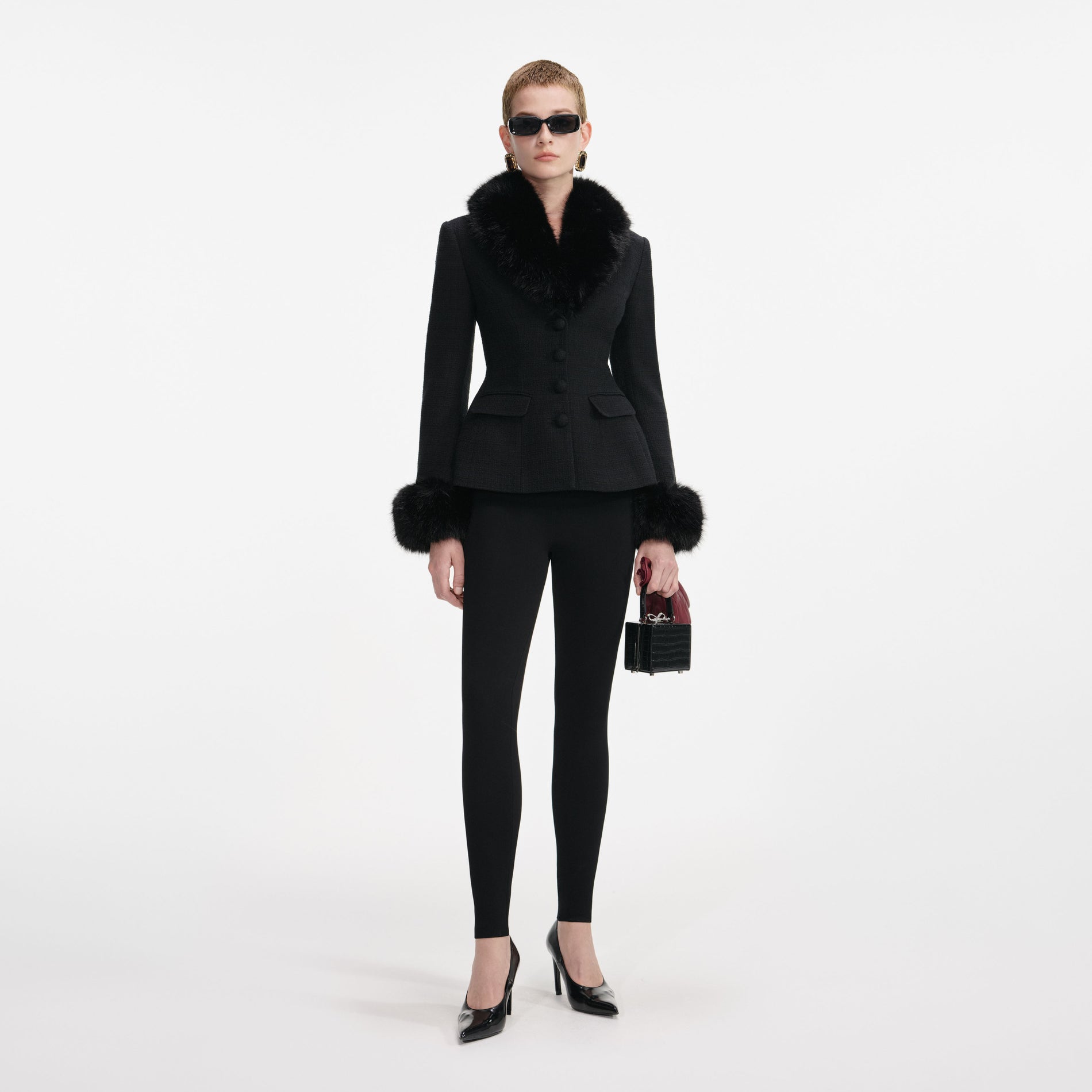 Front view of a woman wearing the Black Tailored Boucle Fur Jacket