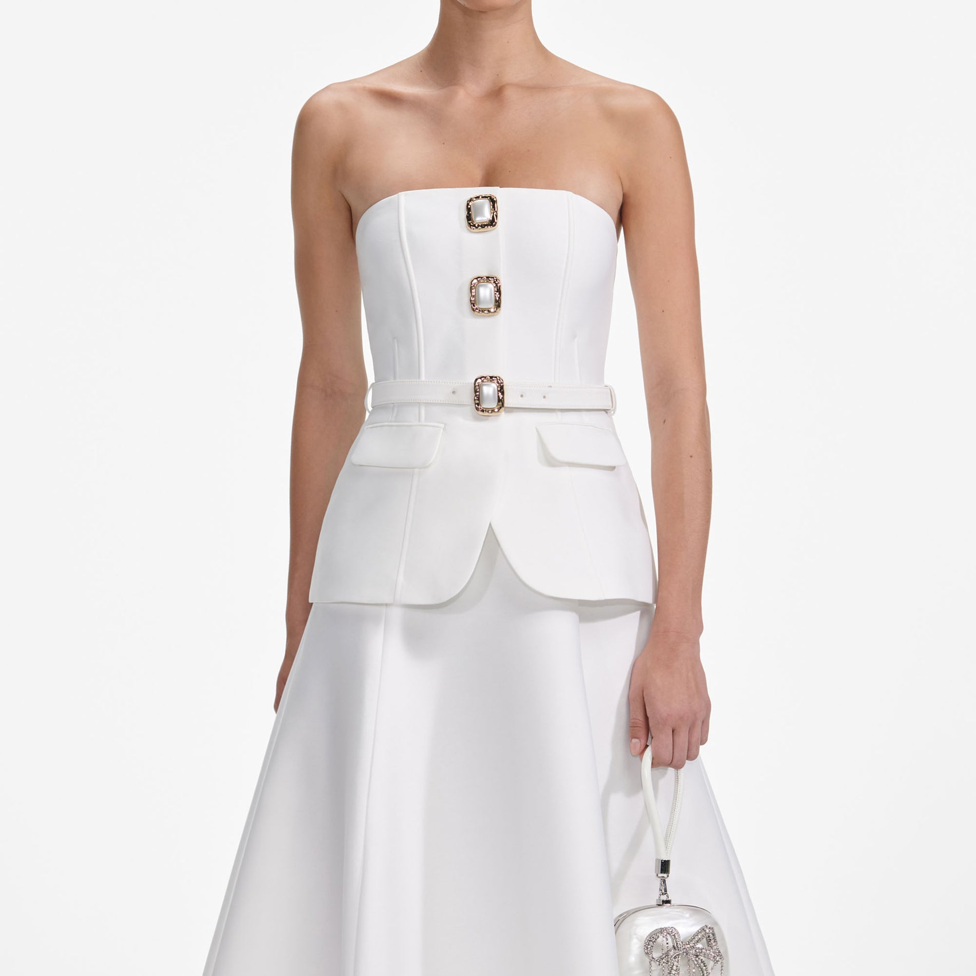 A close up of a woman wearing the White Taffeta Bandeau Midi Dress