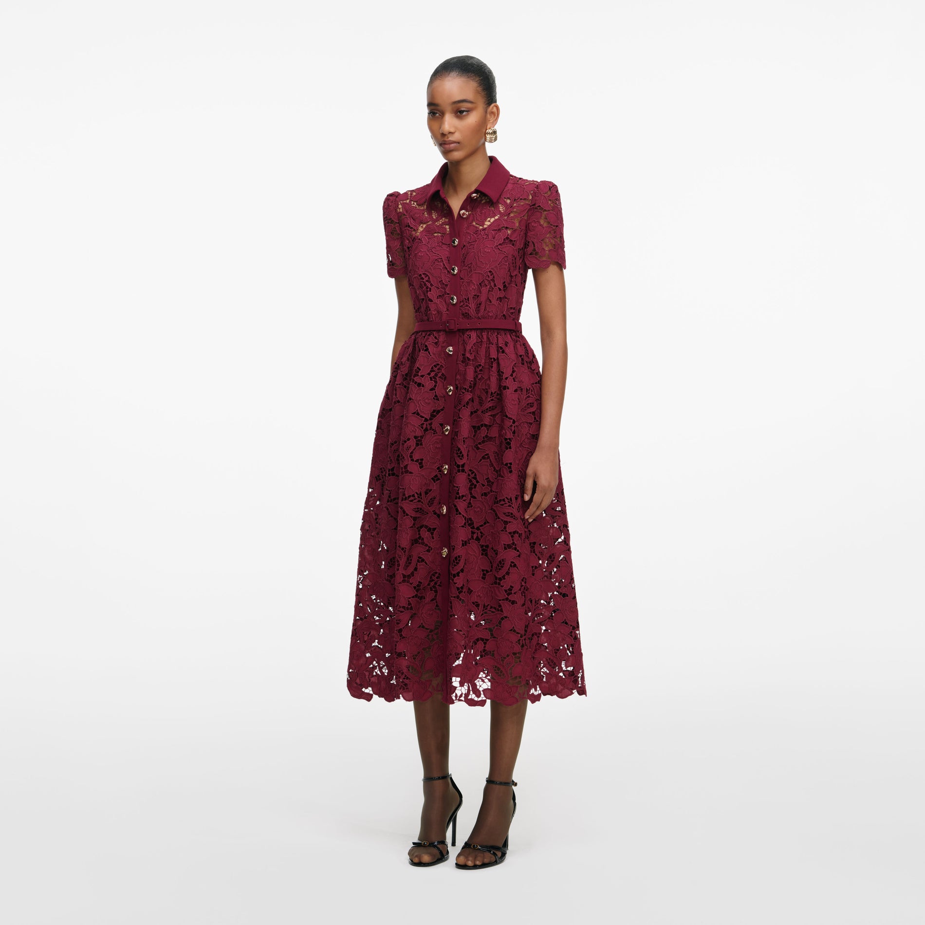 Side view of a woman wearing the Burgundy Lace Collared Midi Dress