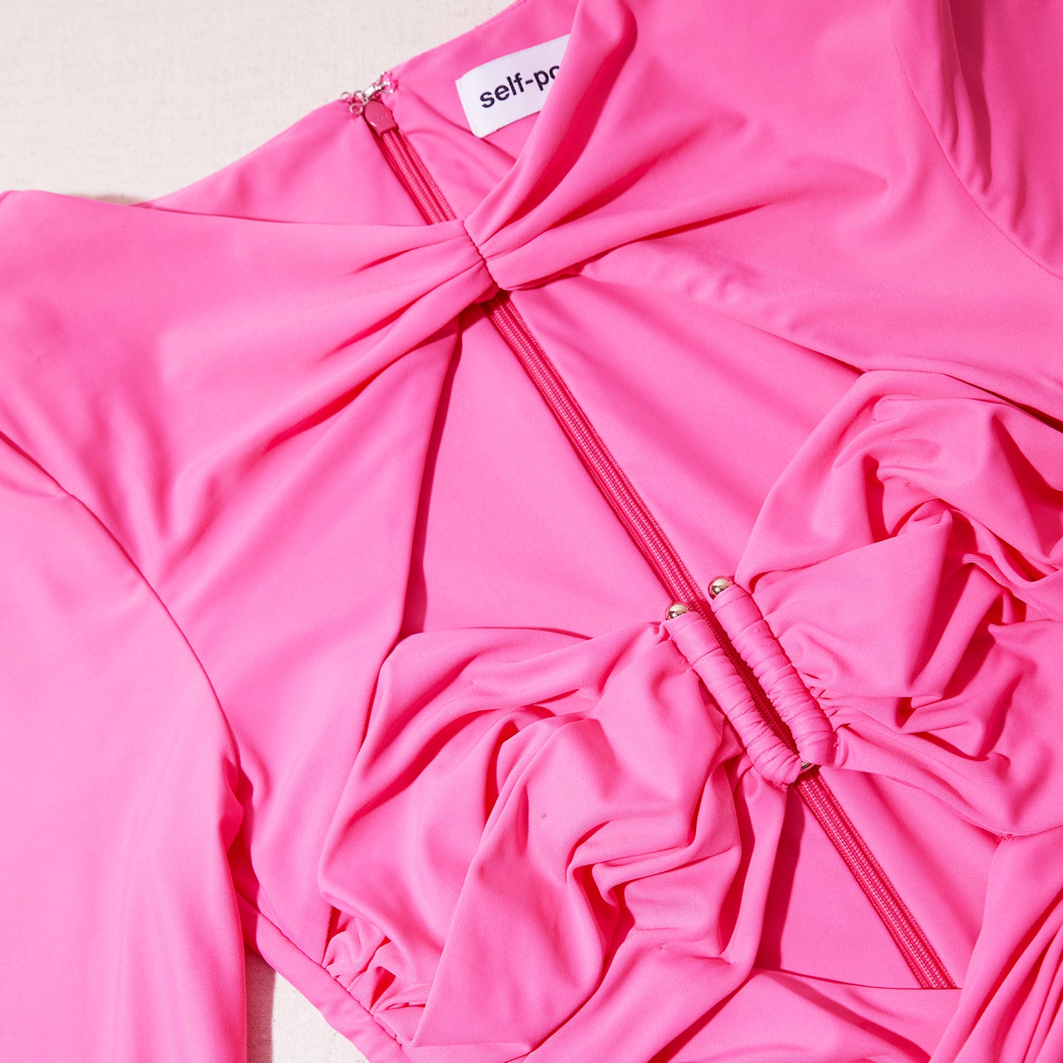 A close up of the fabric for the Pink Jersey Midi Dress