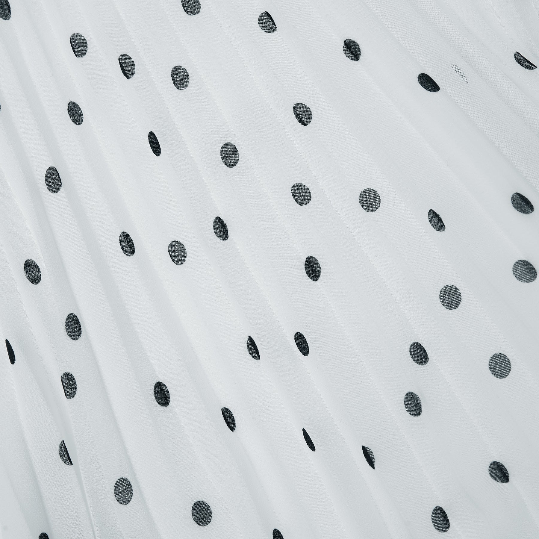 A close up of the fabric for the Chiffon Polka Dot Dress