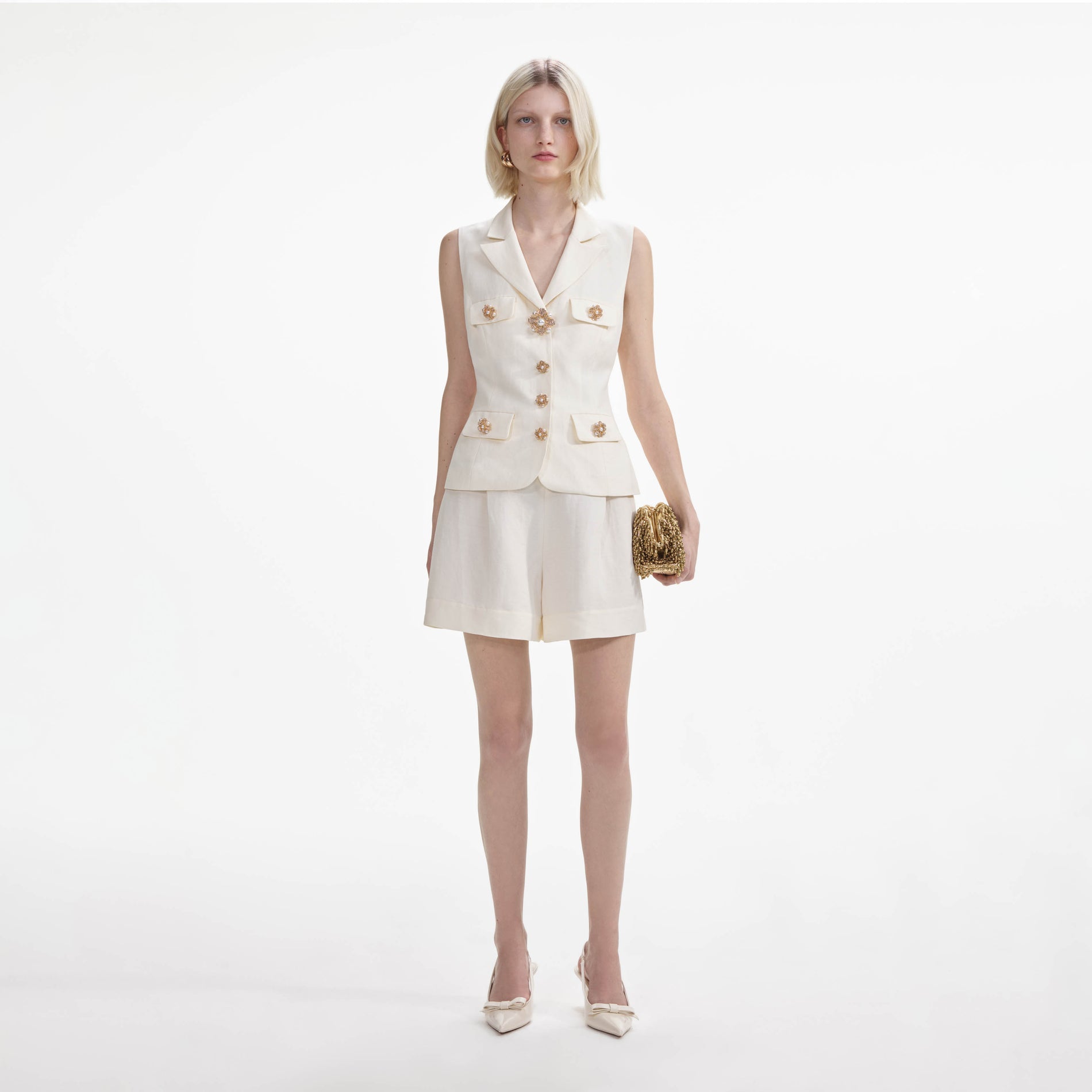 Front view of a woman wearing the Cream Linen Tailored Playsuit