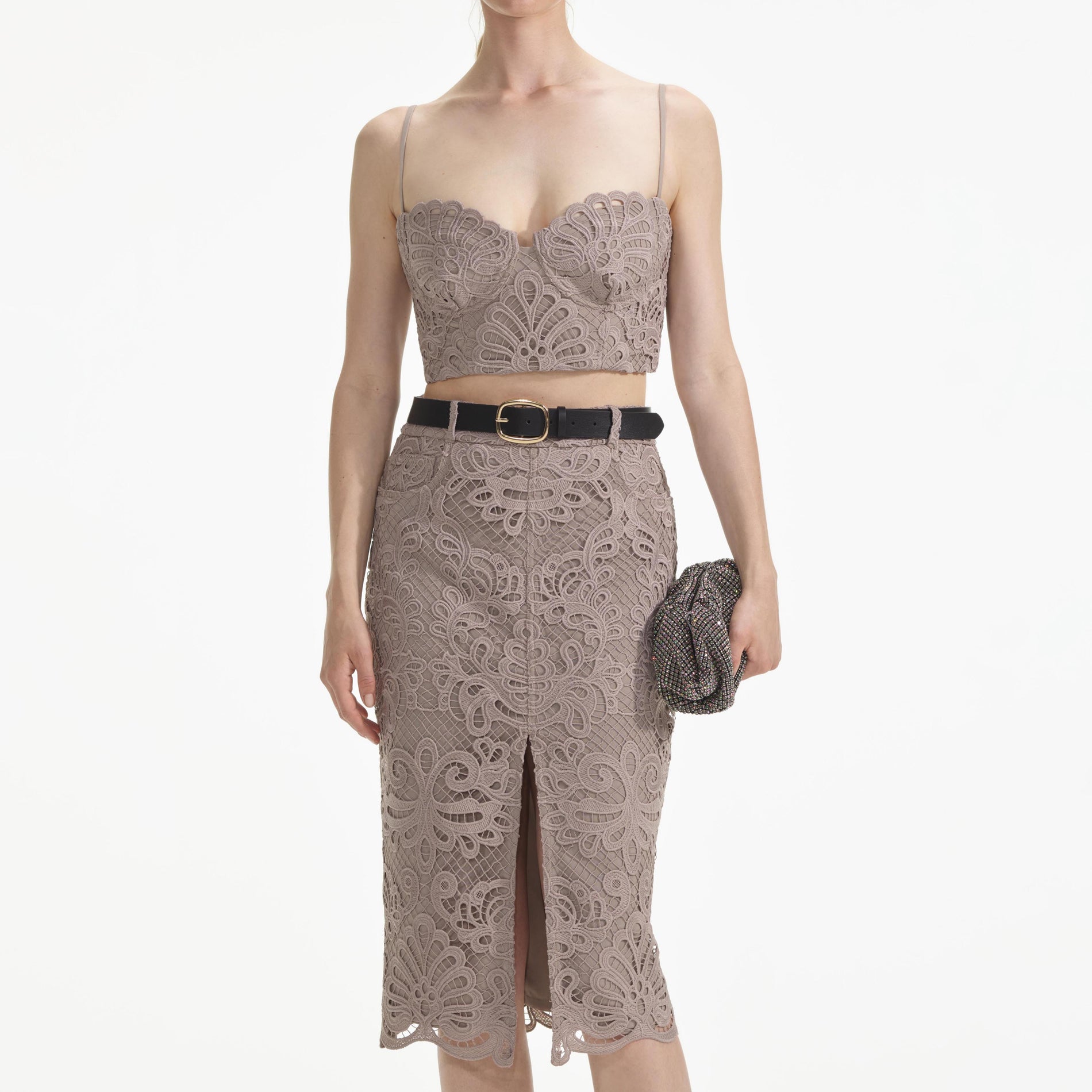 A close up of a woman wearing the Guipure Lace Crop Top