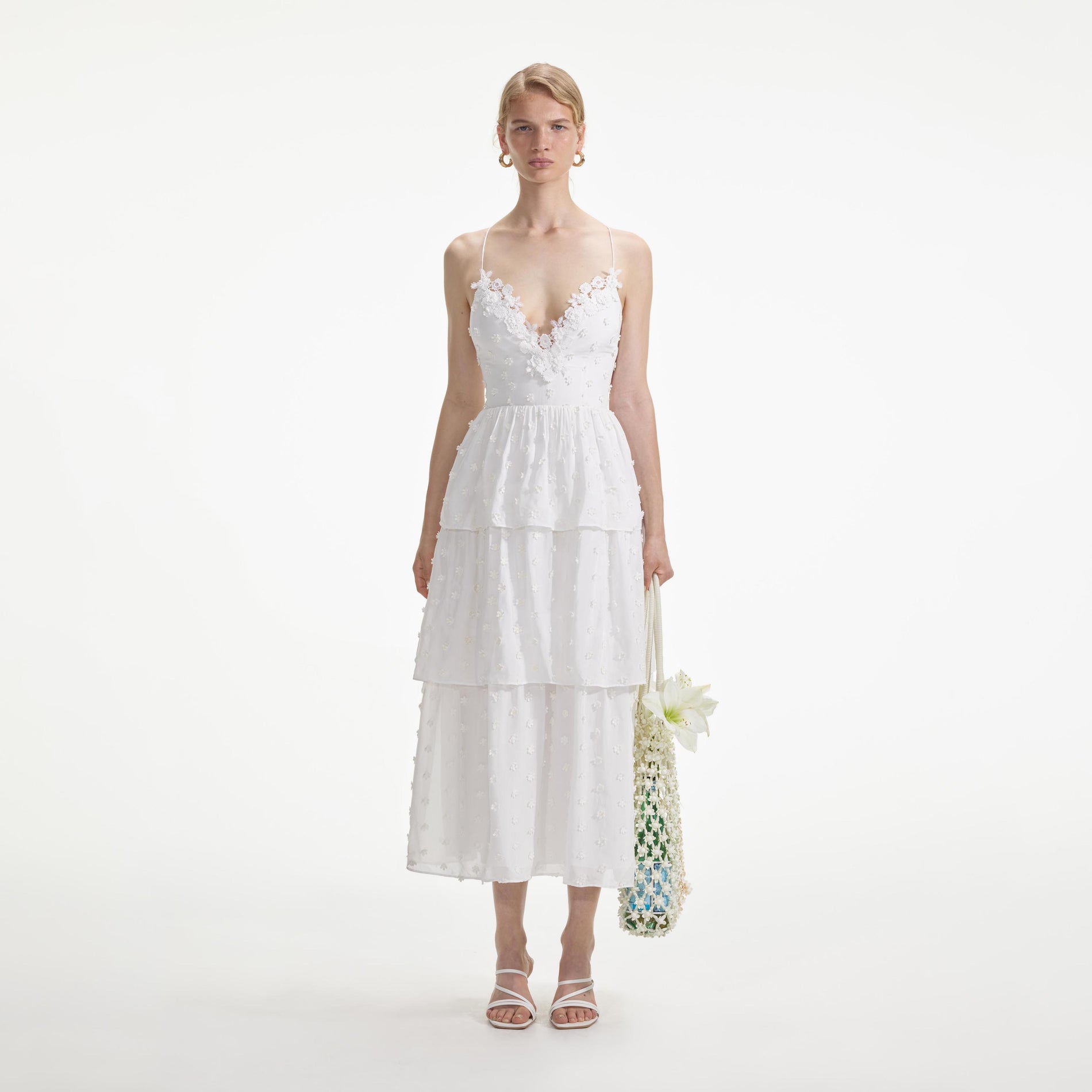 Front view of a woman wearing the White Tie Back Midi Dress
