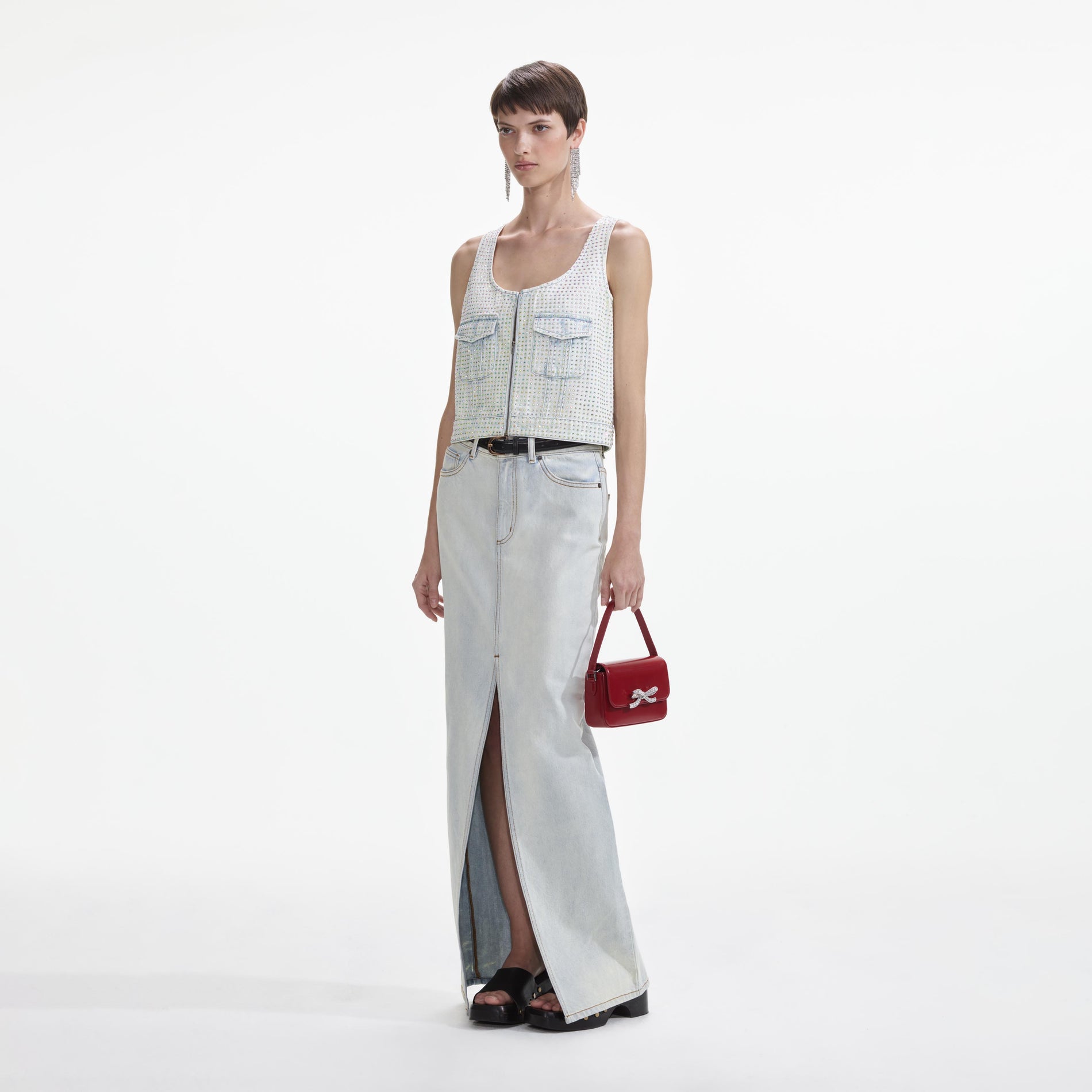 Side view of a woman wearing the Rhinestone Denim Cargo Top