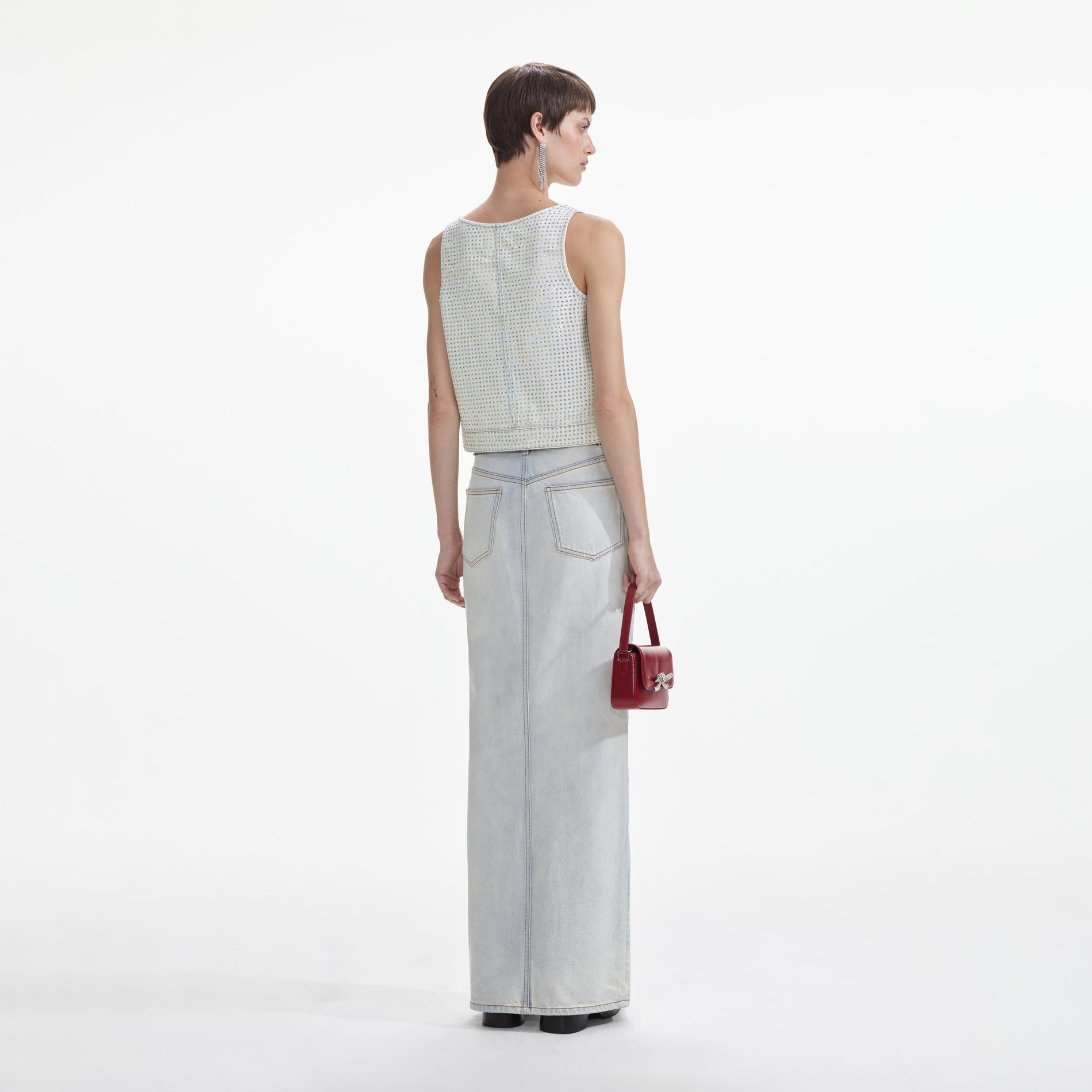 Back view of a woman wearing the Rhinestone Denim Cargo Top