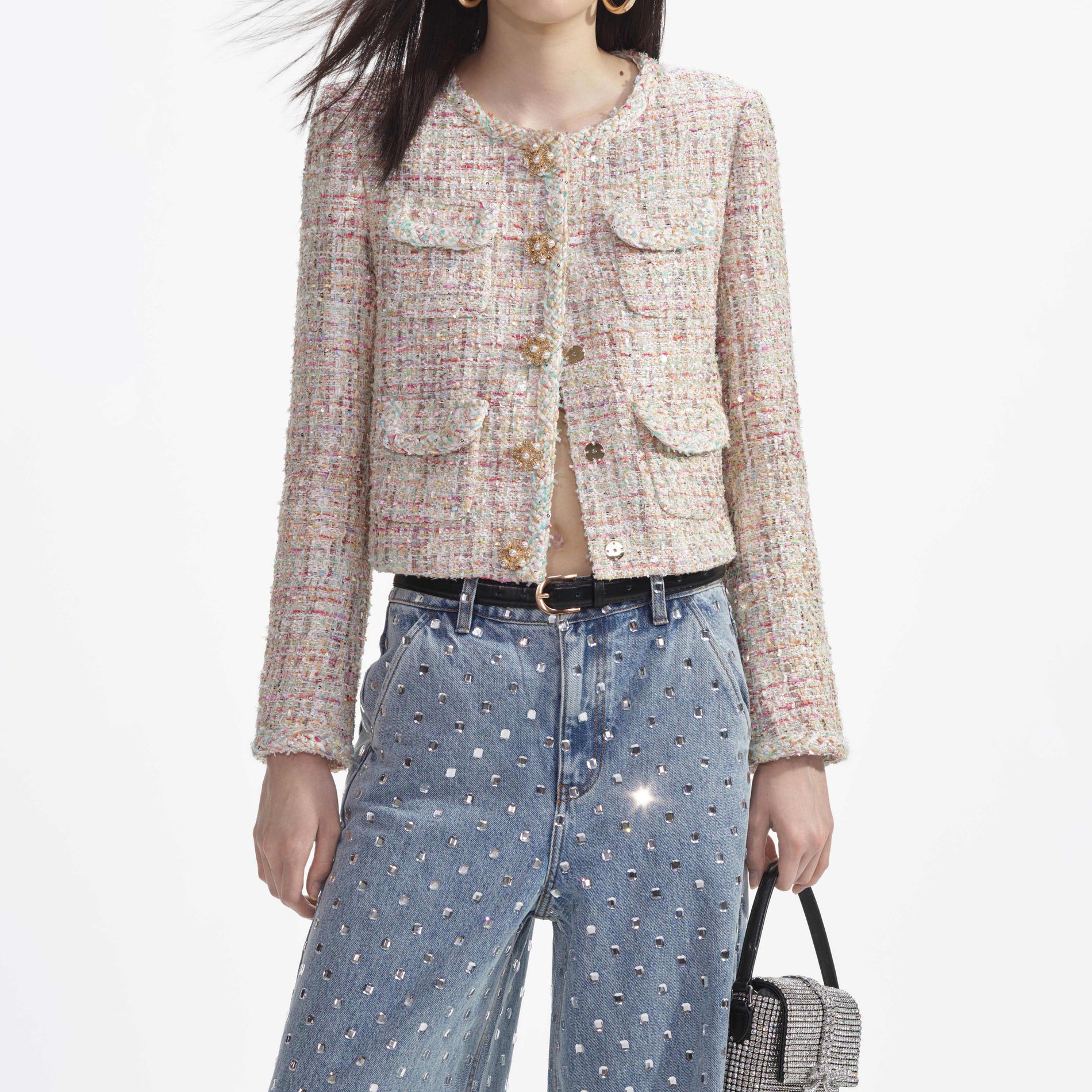 A close up of a woman wearing the Pastel Boucle Boxy Jacket