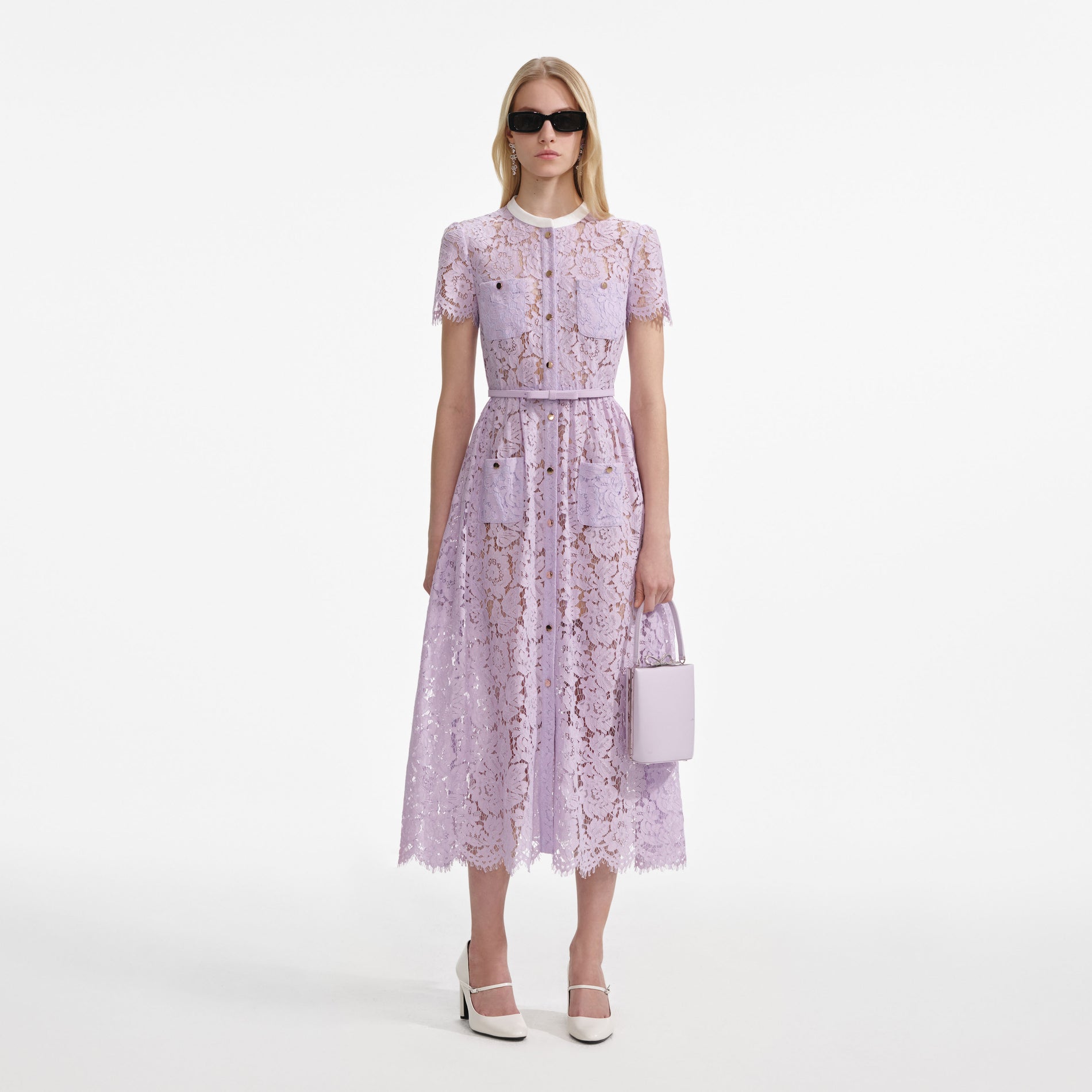 Front view of a woman wearing the Lilac Lace Button Front Midi Dress