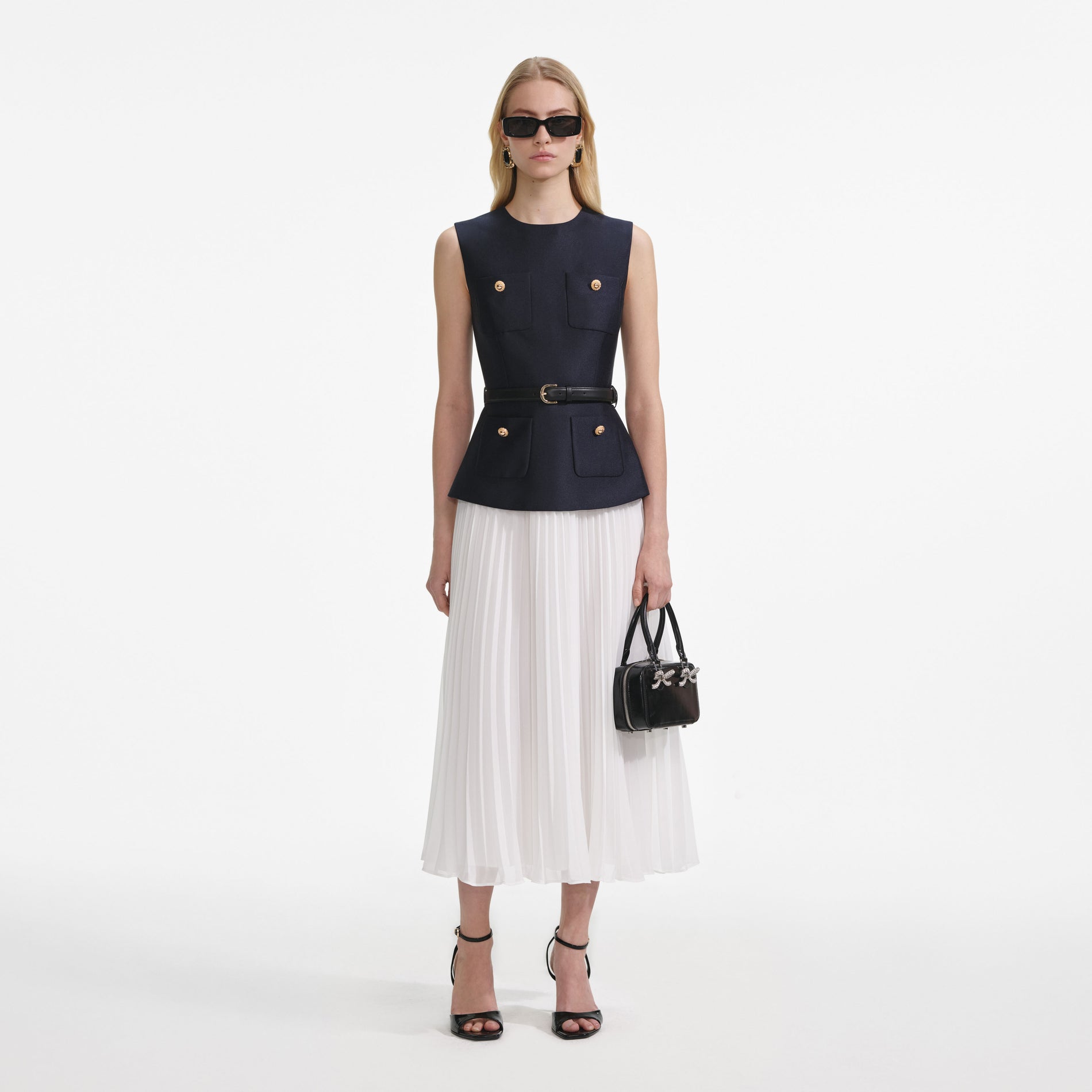 Front view of a woman wearing the Navy Taffeta Midi Dress