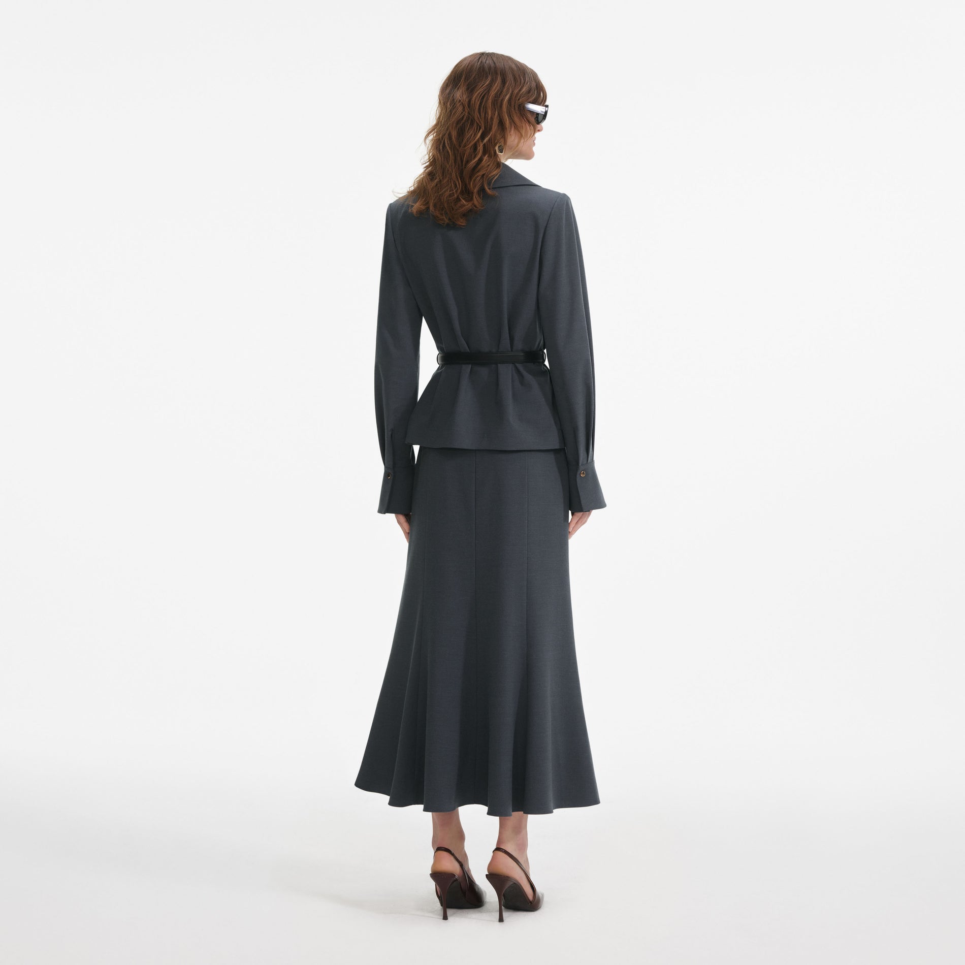 Back view of a woman wearing the Grey Twill Midi Dress