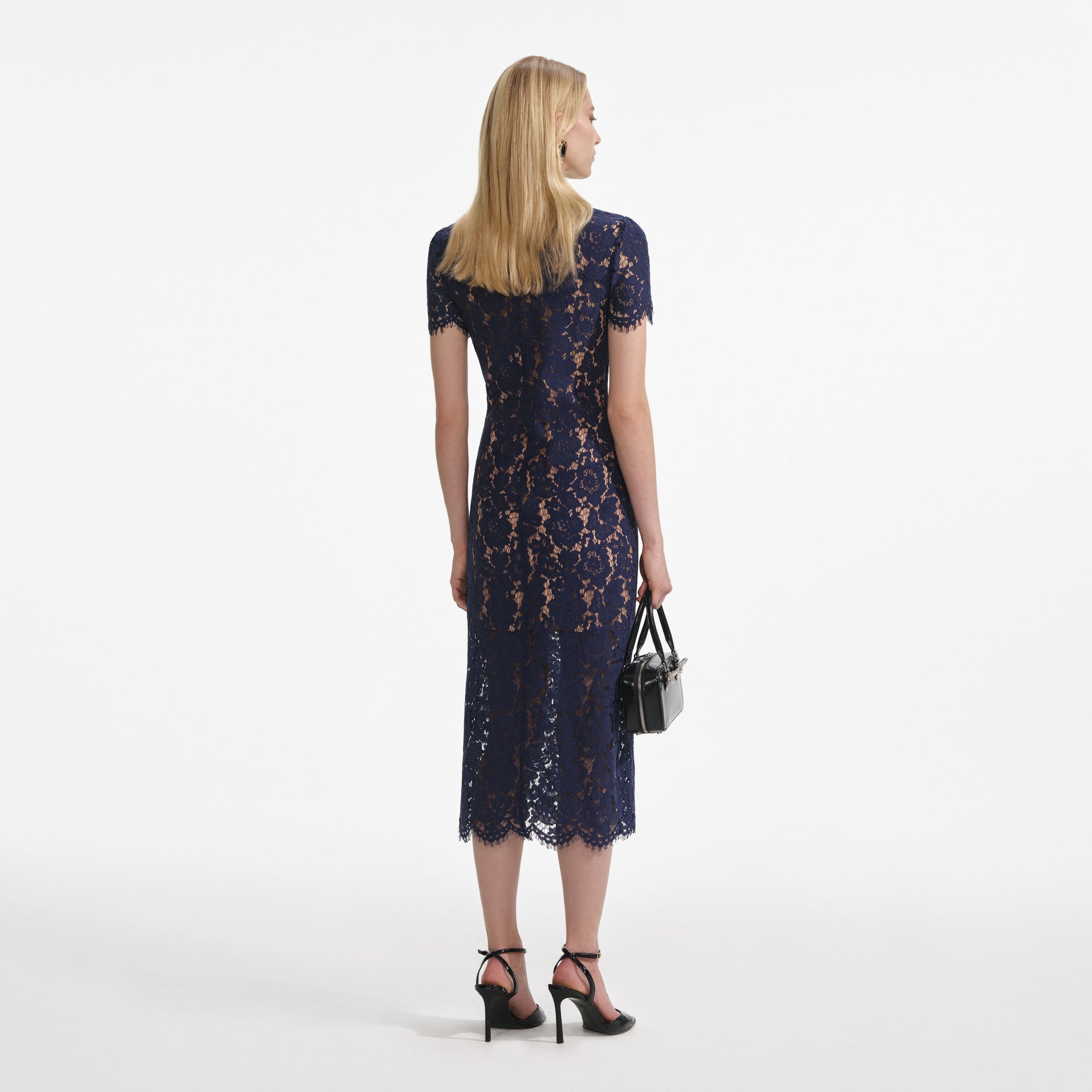 Back view of a woman wearing the Navy Lace Contrast Collar Midi Dress