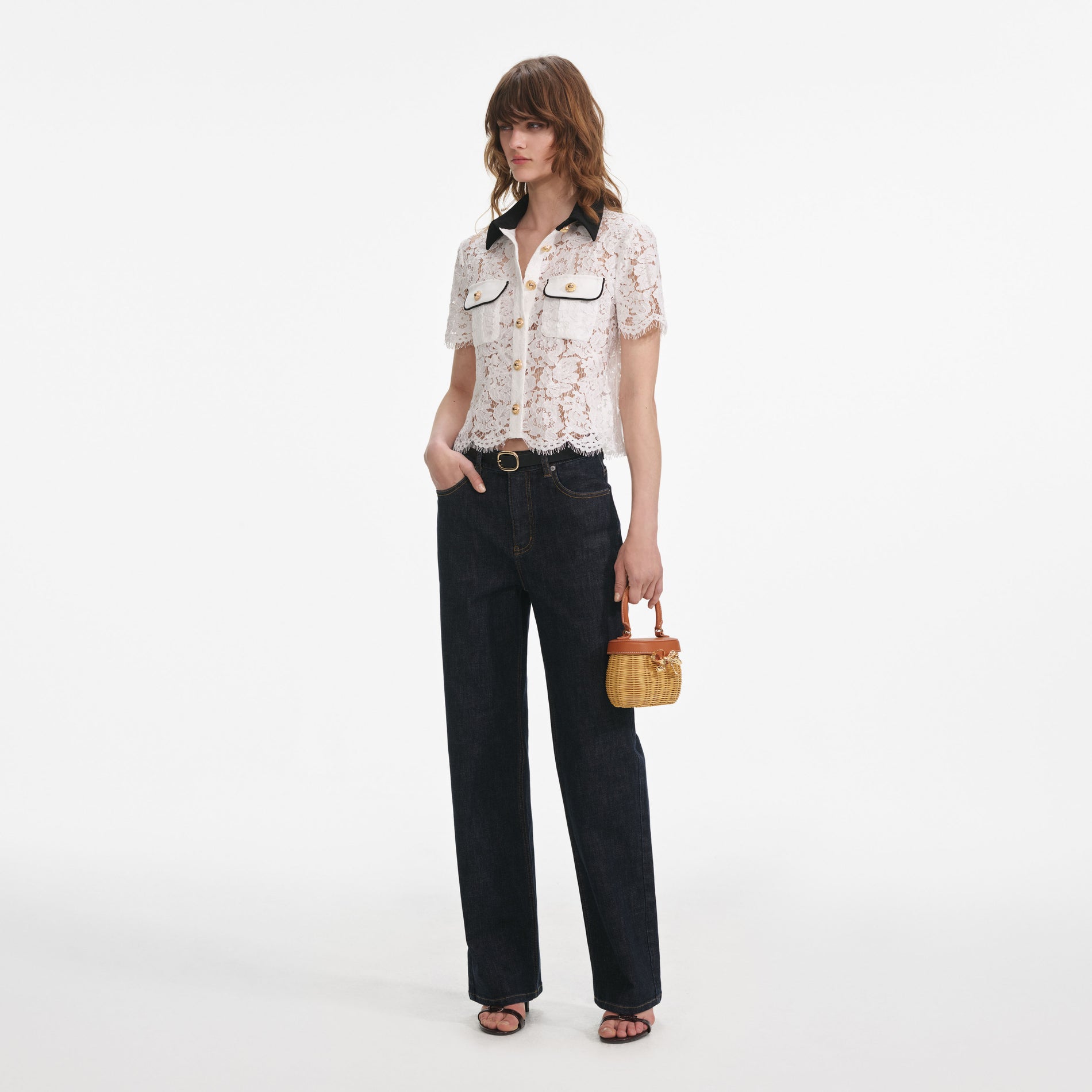 Side view of a woman wearing the White Lace Contrast Collar Top