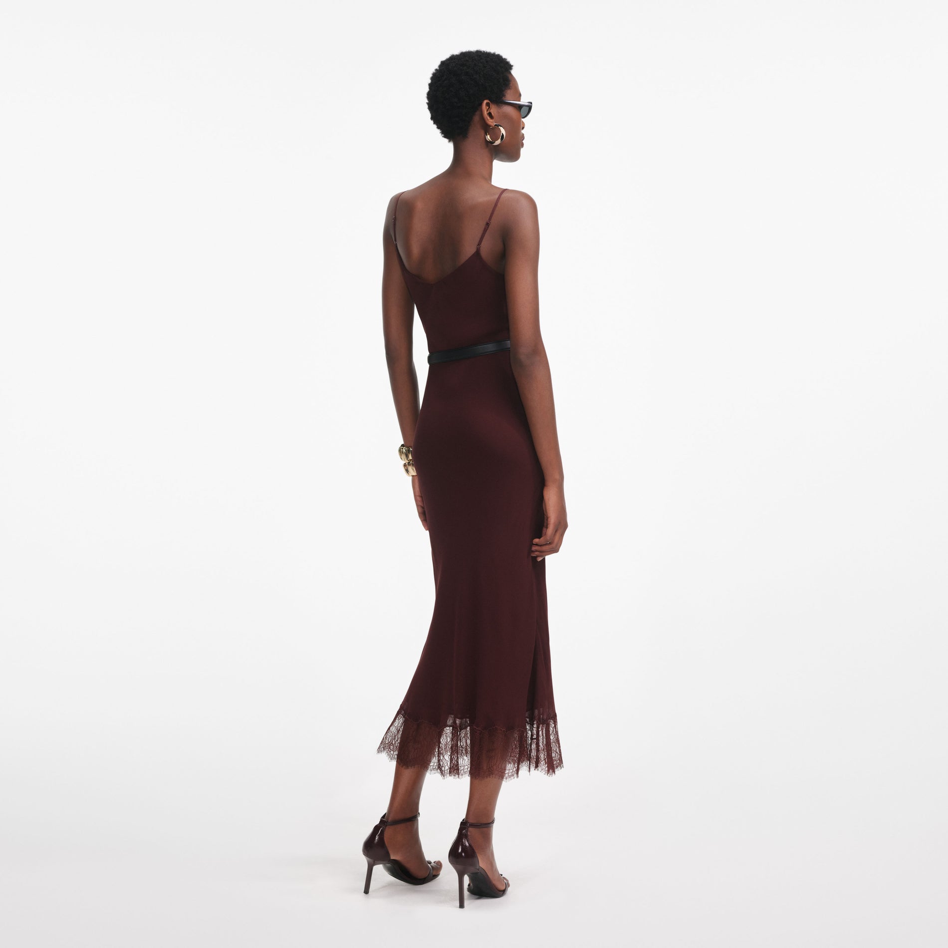 Back view of a woman wearing the Brown Lace Insert Midi Dress