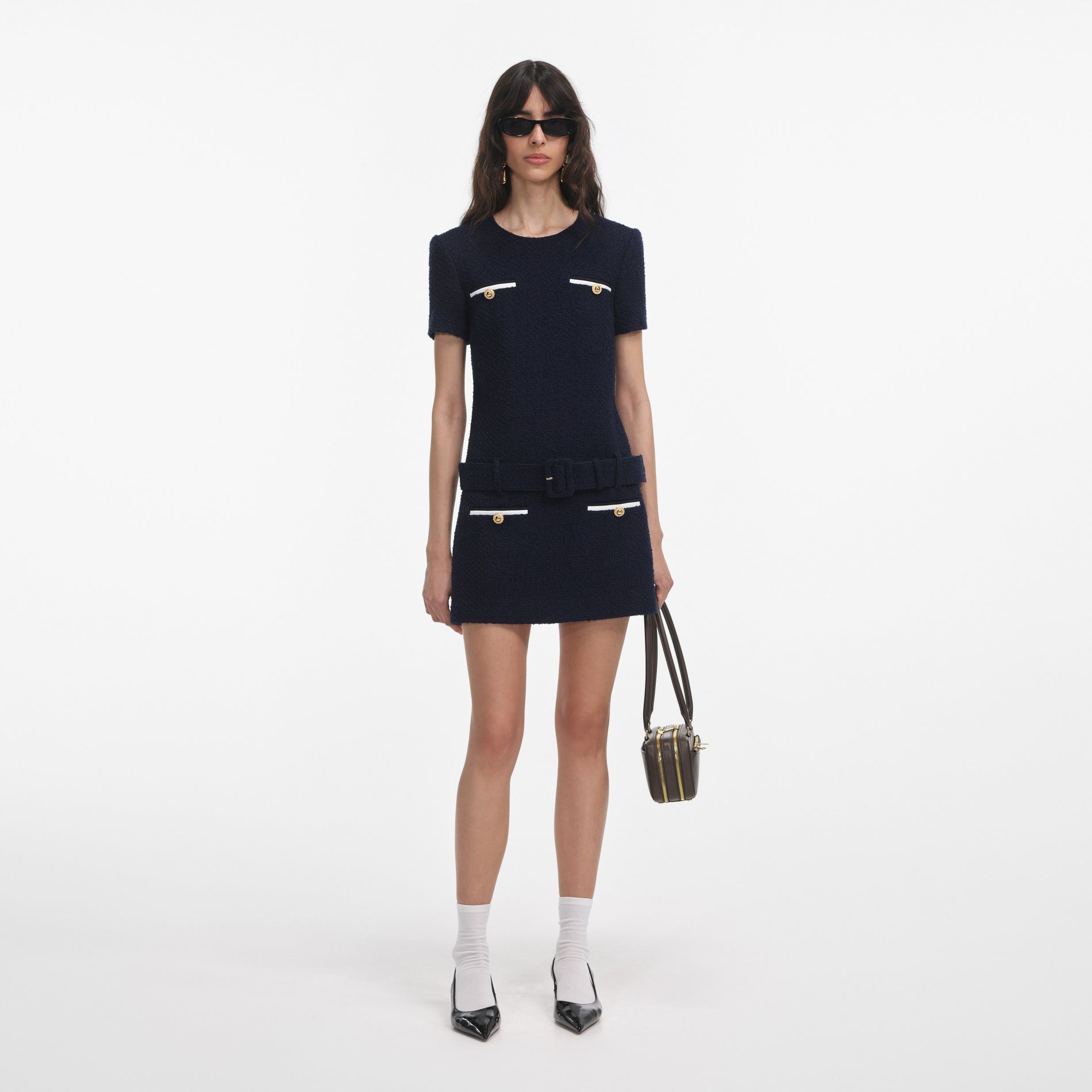 Front view of a woman wearing the Navy Boucle Mini Dress