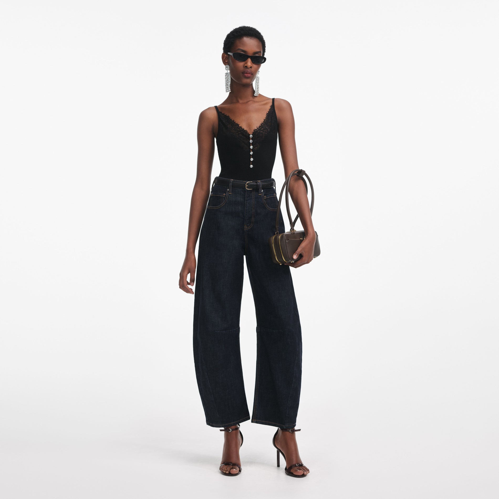 Front view of a woman wearing the Black Lace Trim Rib Knit Top