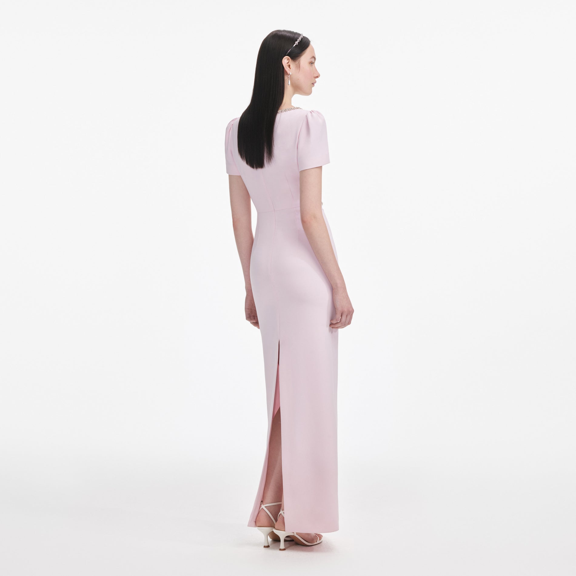 Back view of a woman wearing the Pink Crepe Crystal Trim Maxi Dress