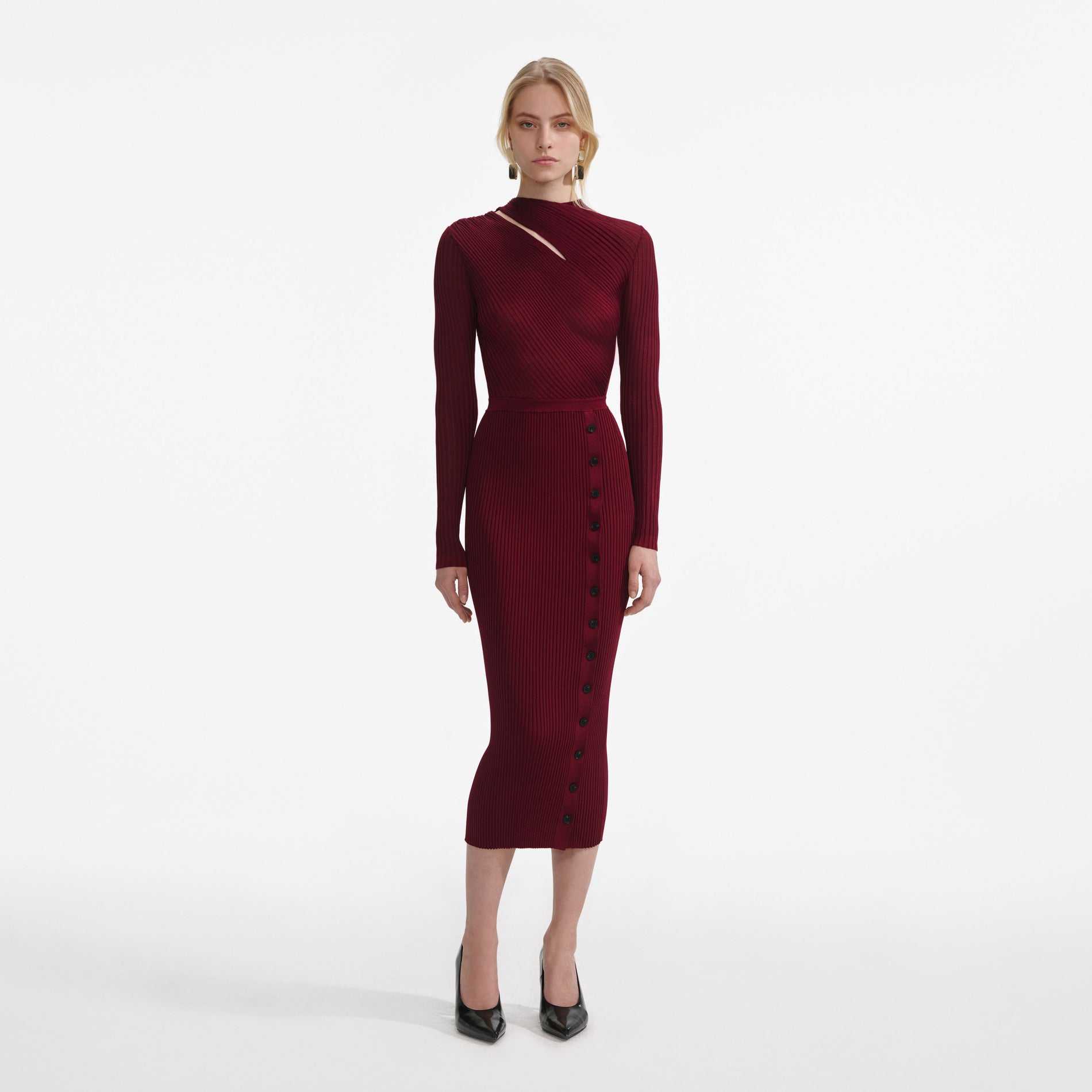 Front view of a woman wearing the Burgundy Cut Out Rib Knit Midi Dress