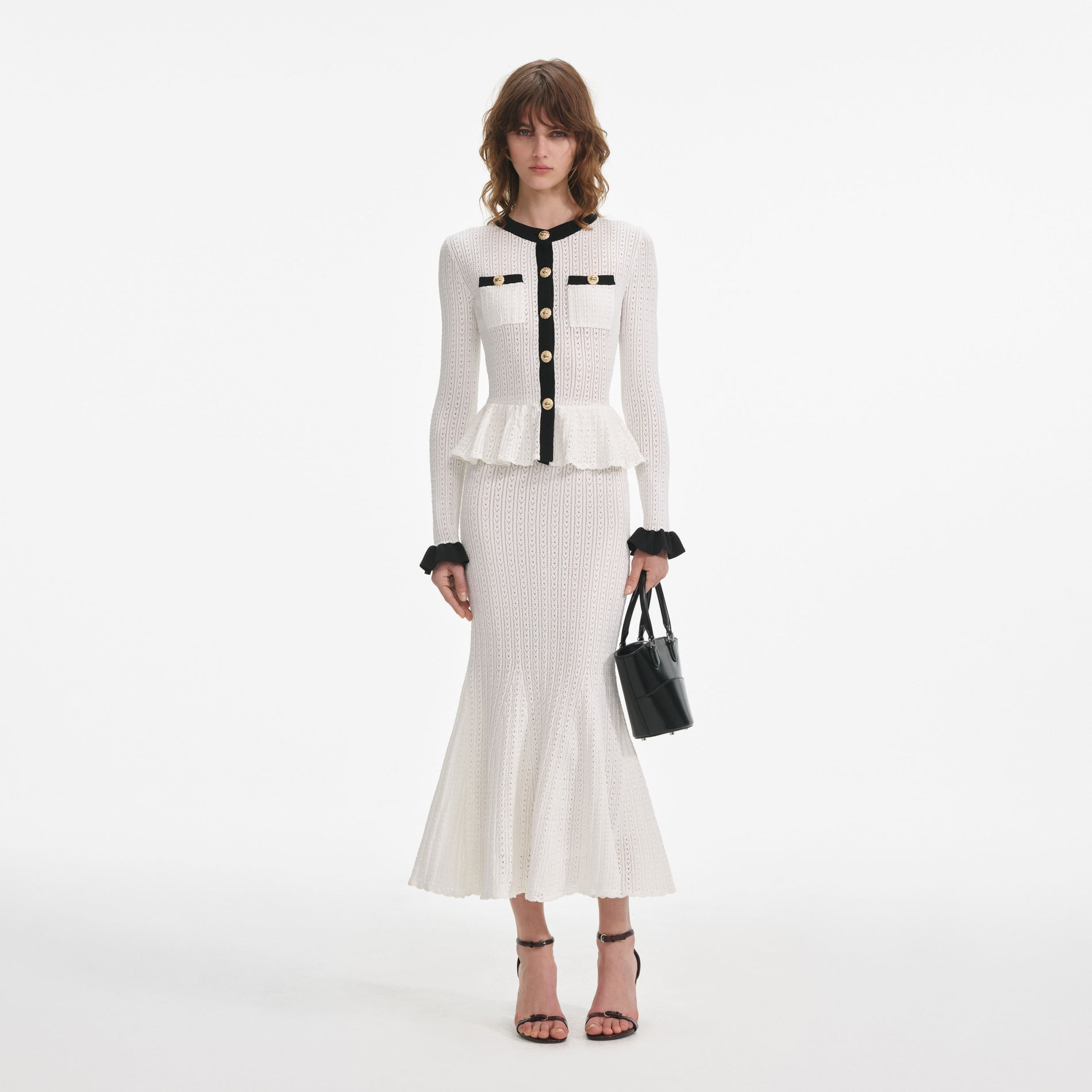 Front view of a woman wearing the White Pointelle Knit Contrast Midi Dress