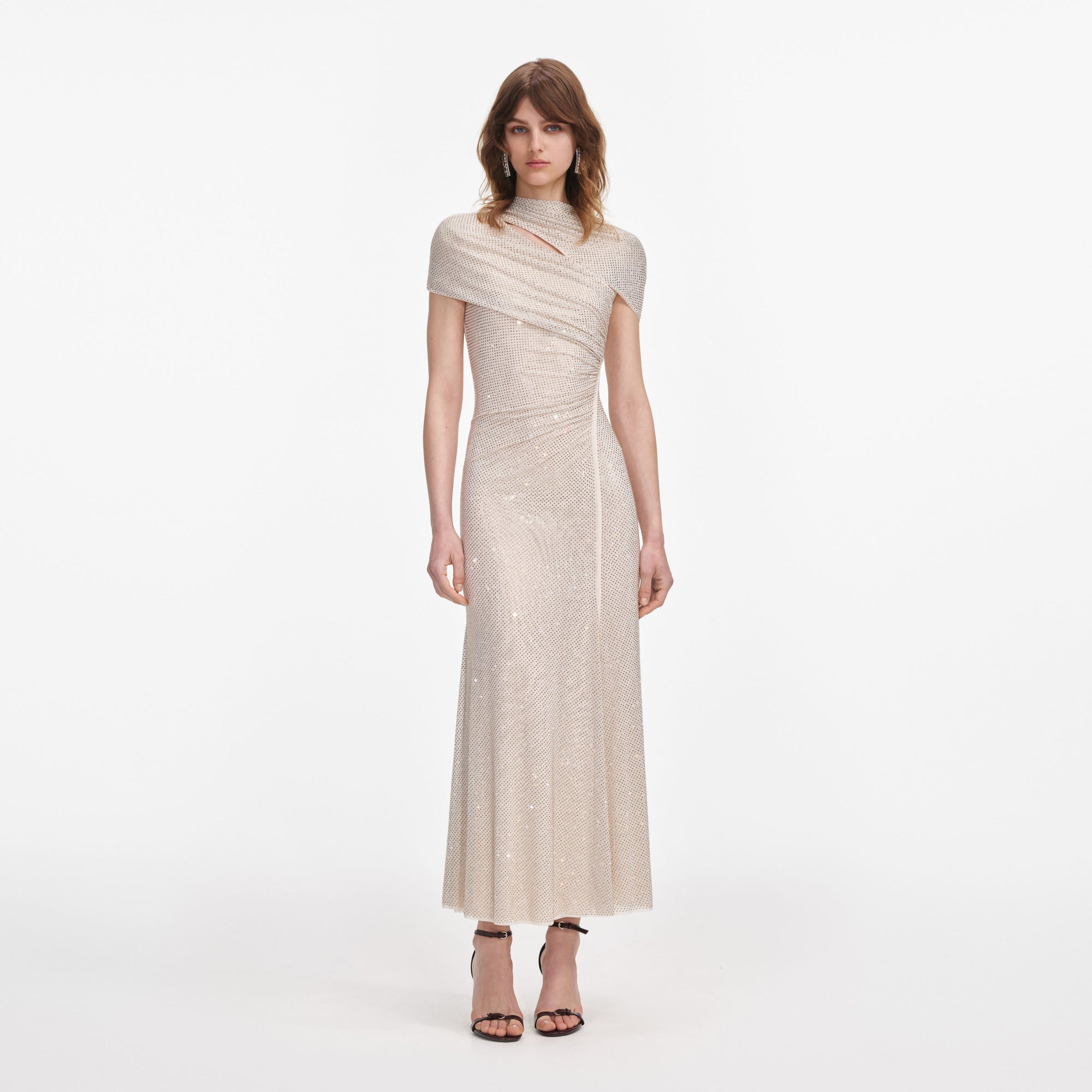 Front view of a woman wearing the Champagne Rhinestone Mesh Cut Out Midi Dress