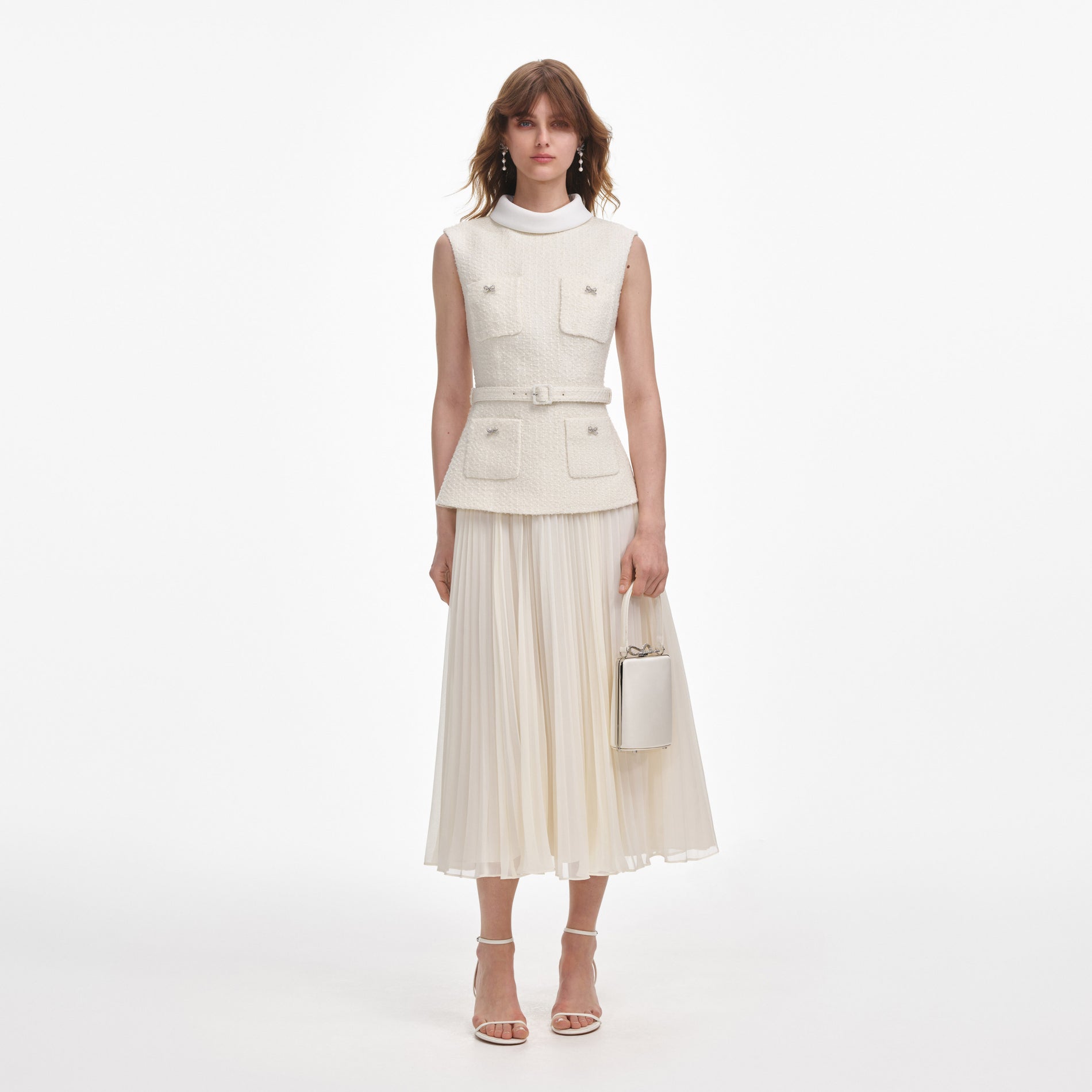 Front view of a woman wearing the Cream Boucle Sleeveless Midi Dress