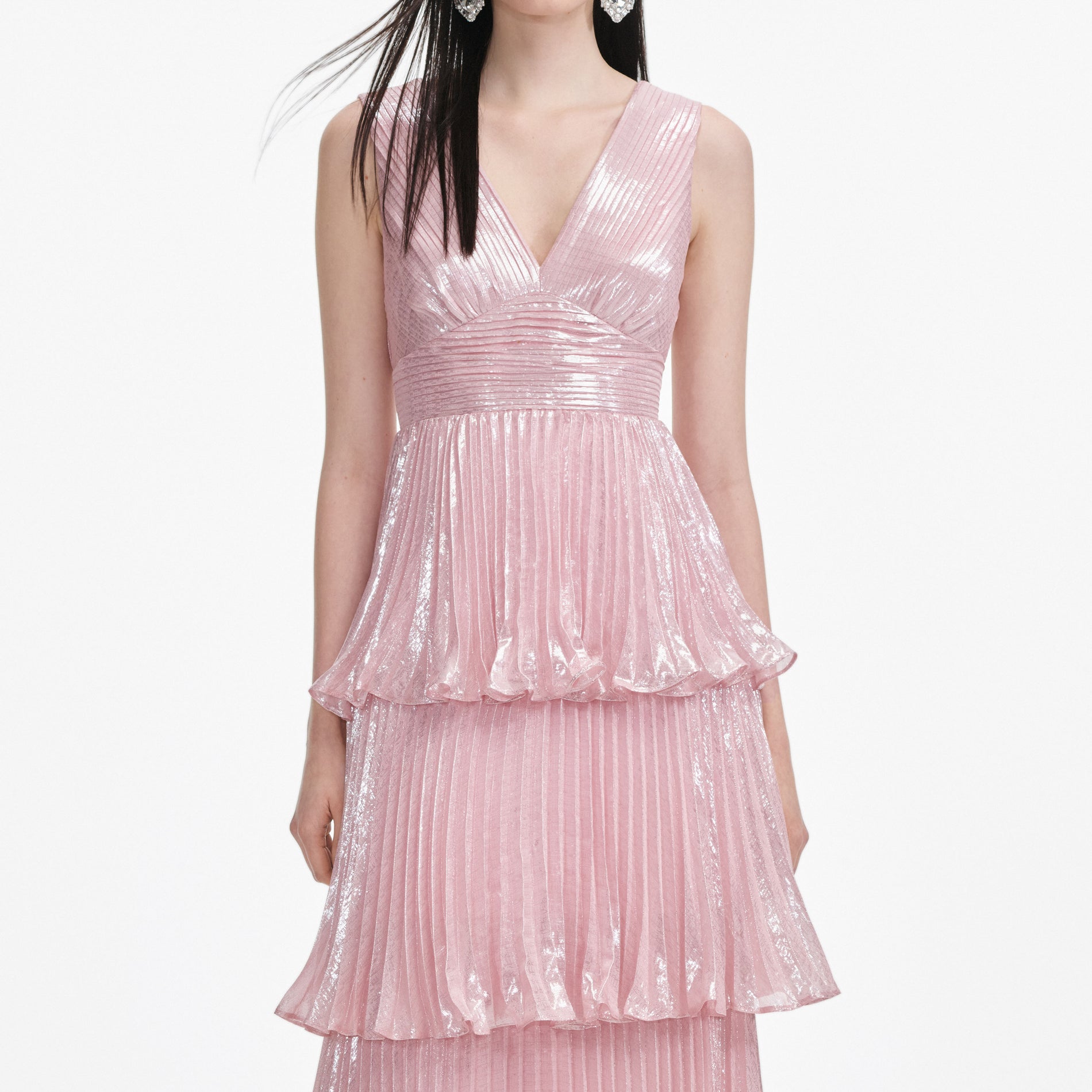 A close up of a woman wearing the Pink Metallic Tiered Maxi Dress
