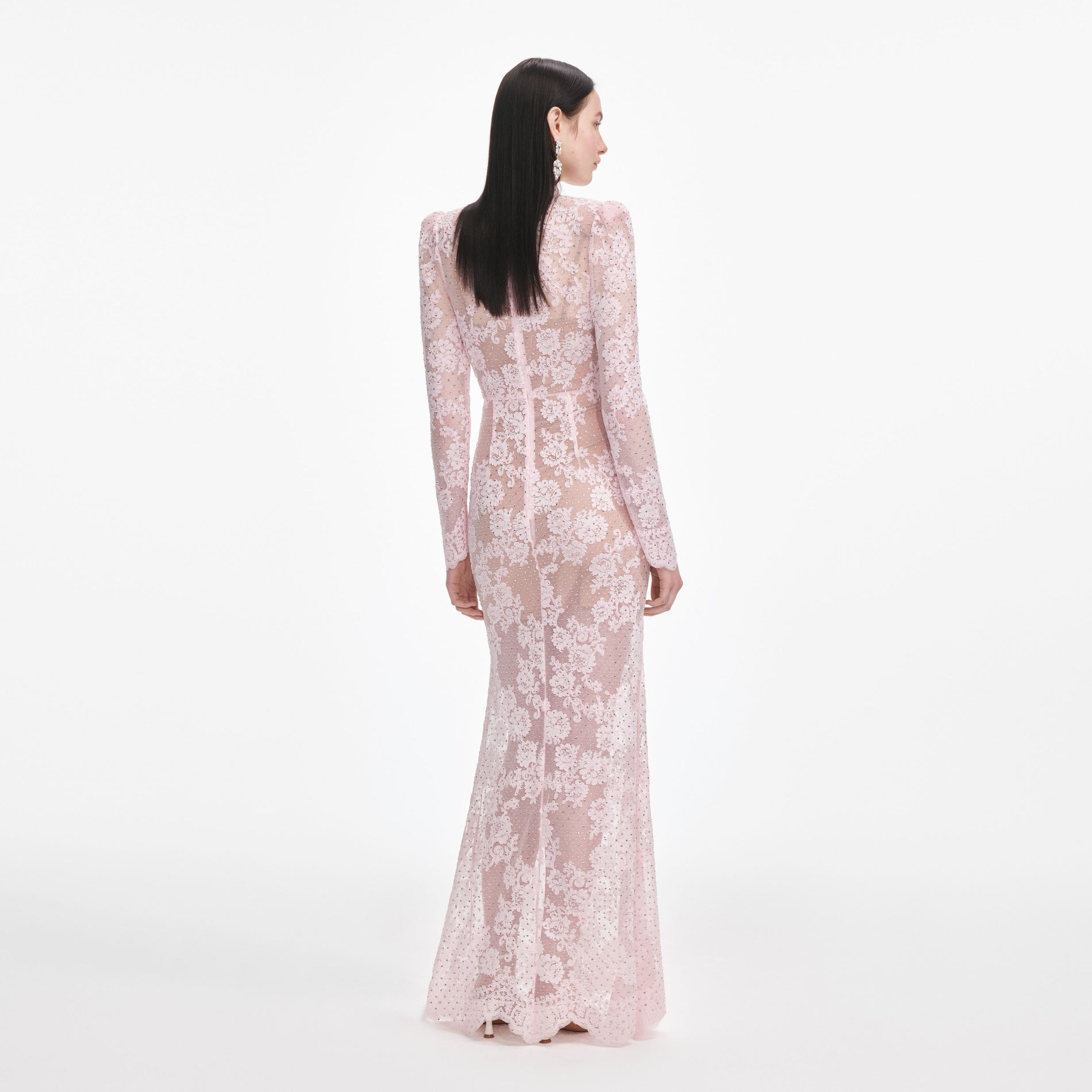 Back view of a woman wearing the Pale Pink Rhinestone Lace Maxi Dress