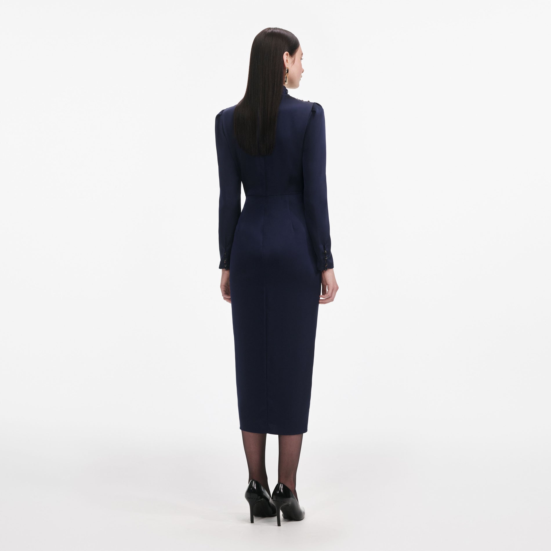 Back view of a woman wearing the Navy Satin Midi Dress