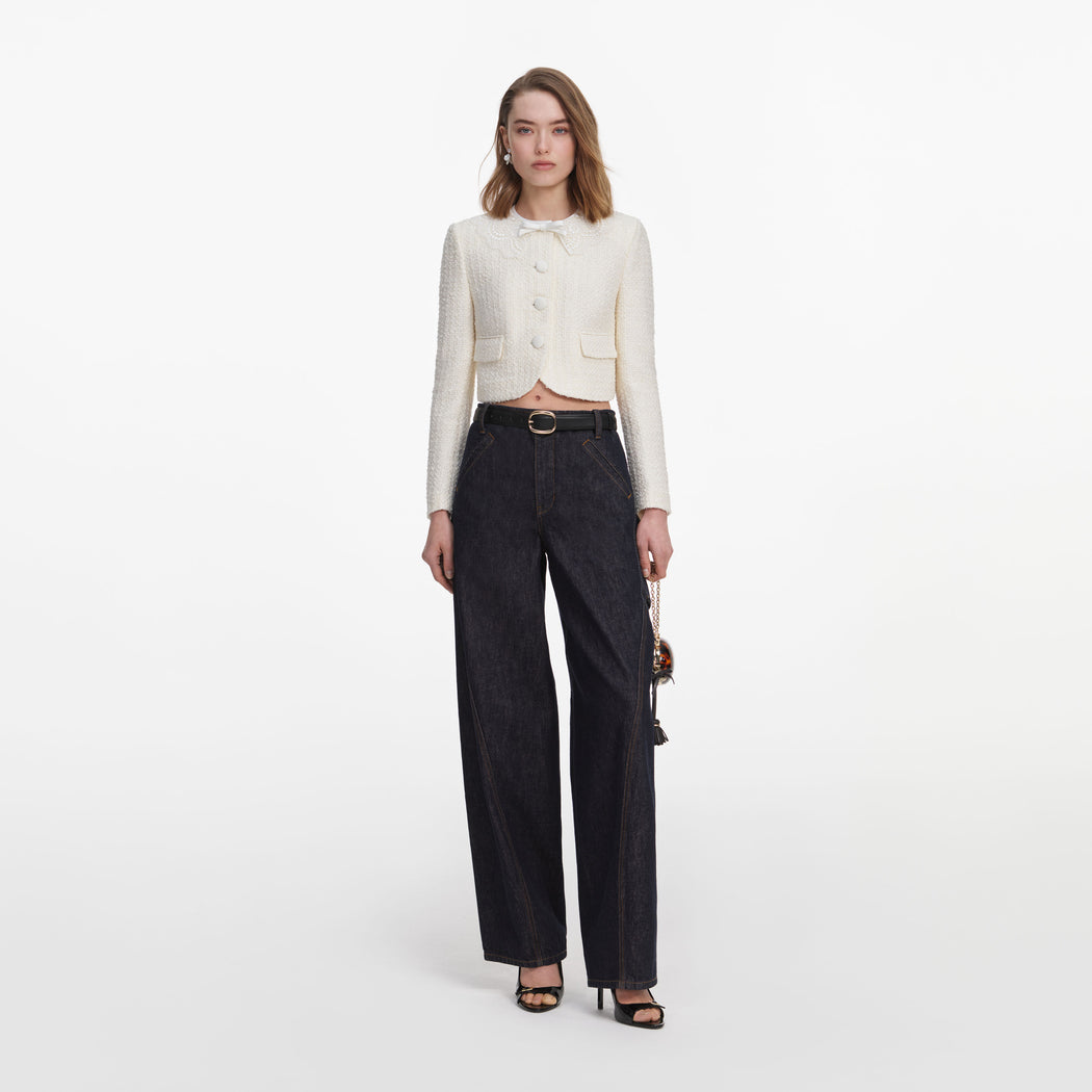 Front view of a woman wearing the Cream Boucle Lace Collar Jacket