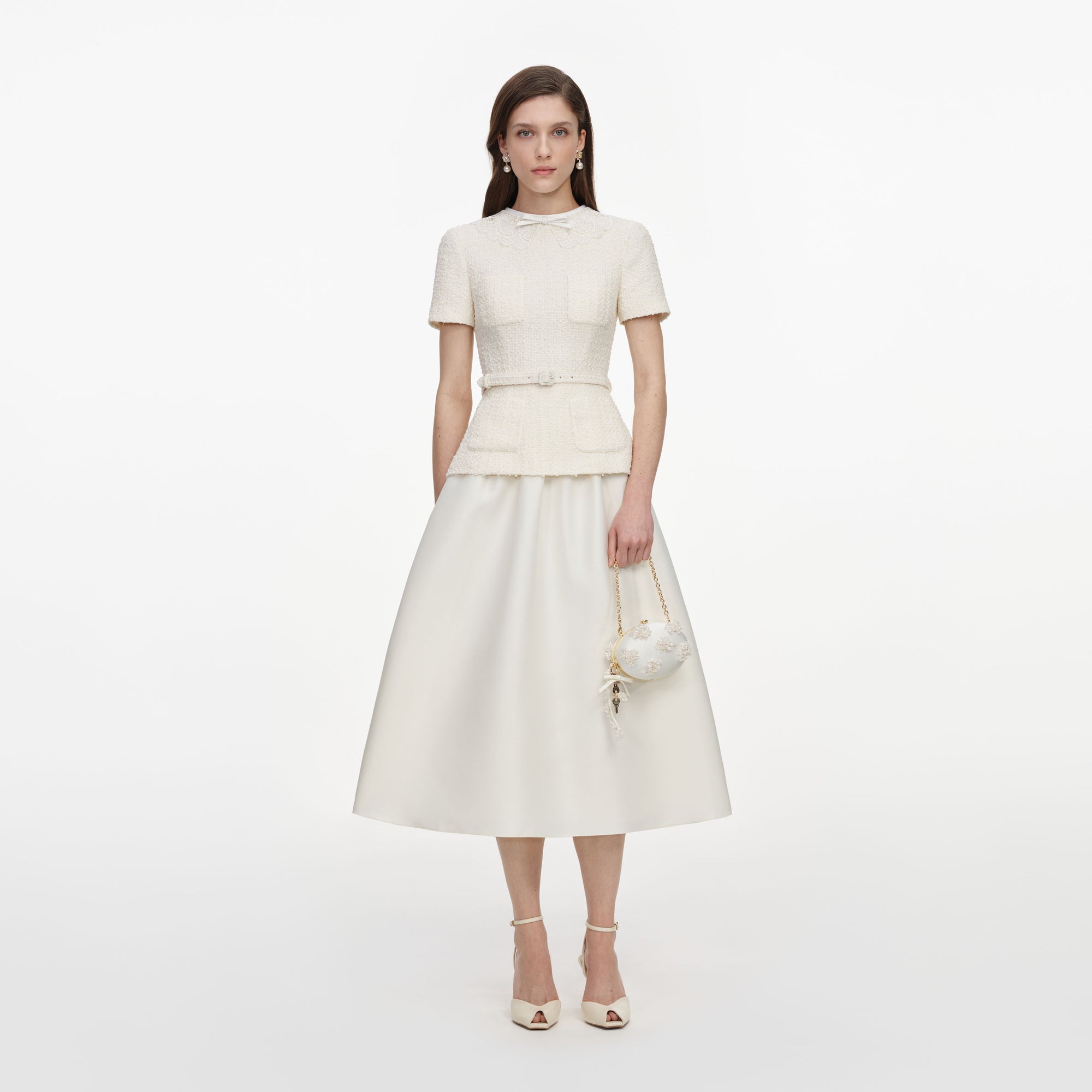 Front view of a woman wearing the Cream Boucle Taffeta Midi Dress