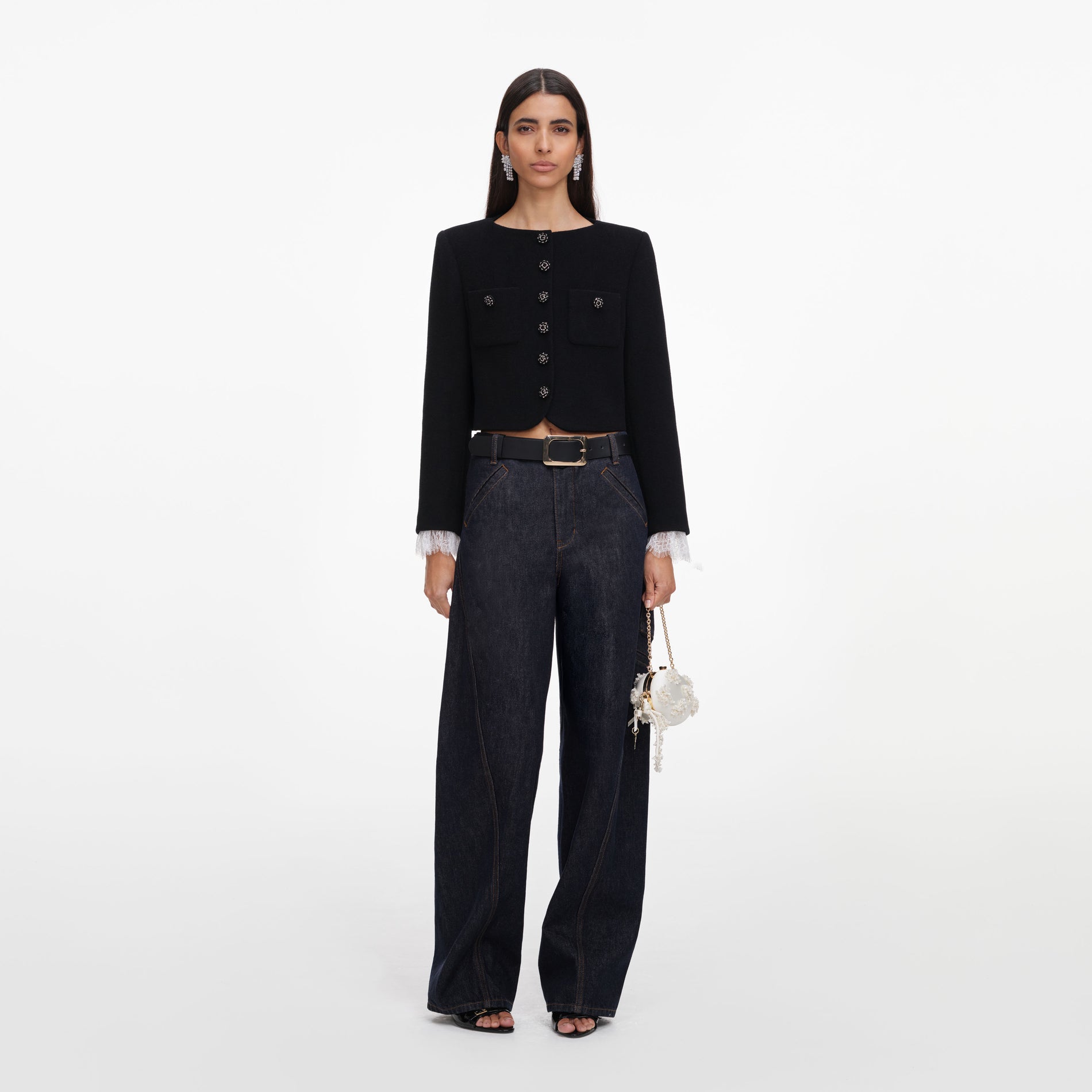 Front view of a woman wearing the Black Button Down Jacket