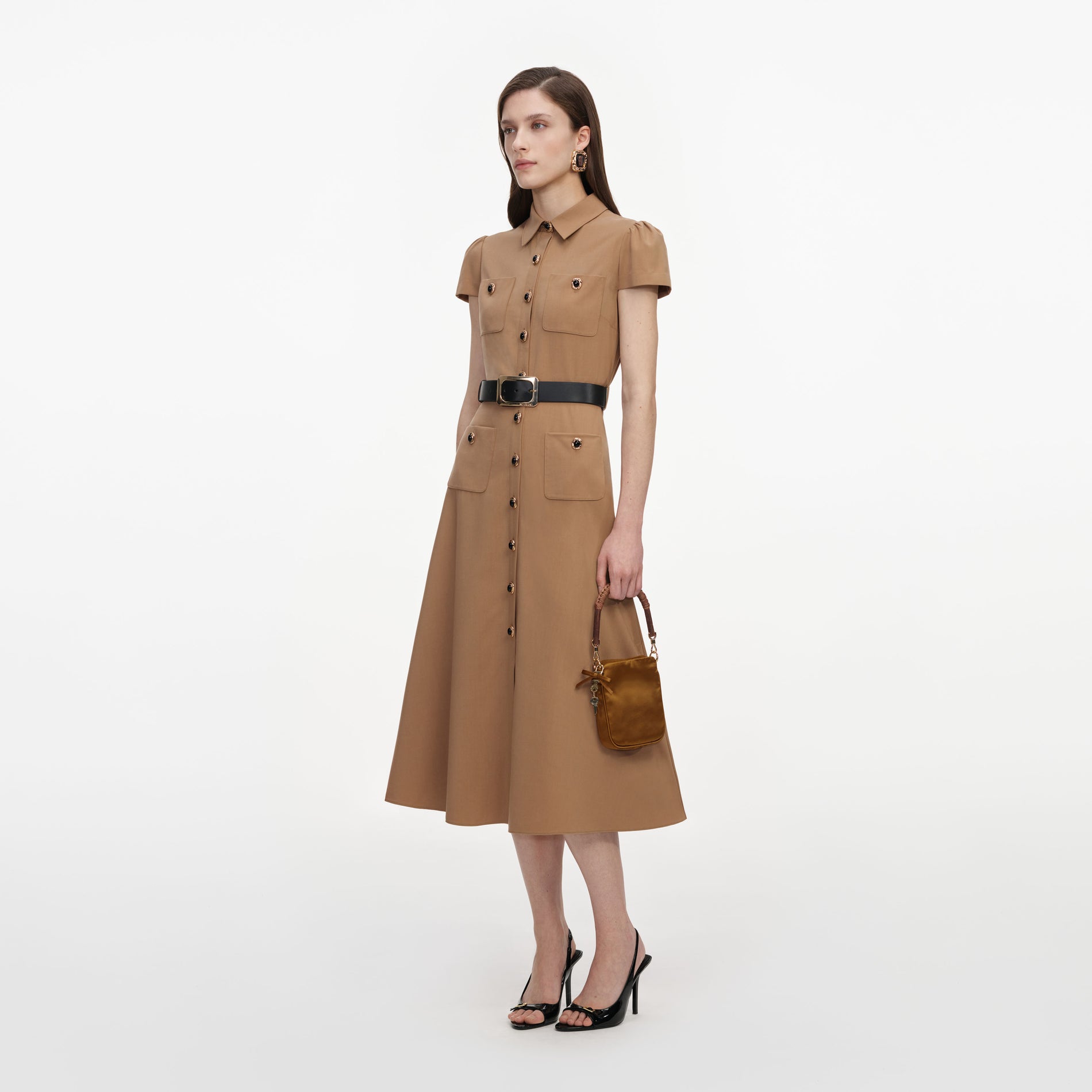 Side view of a woman wearing the Tan Twill Belted Midi Dress
