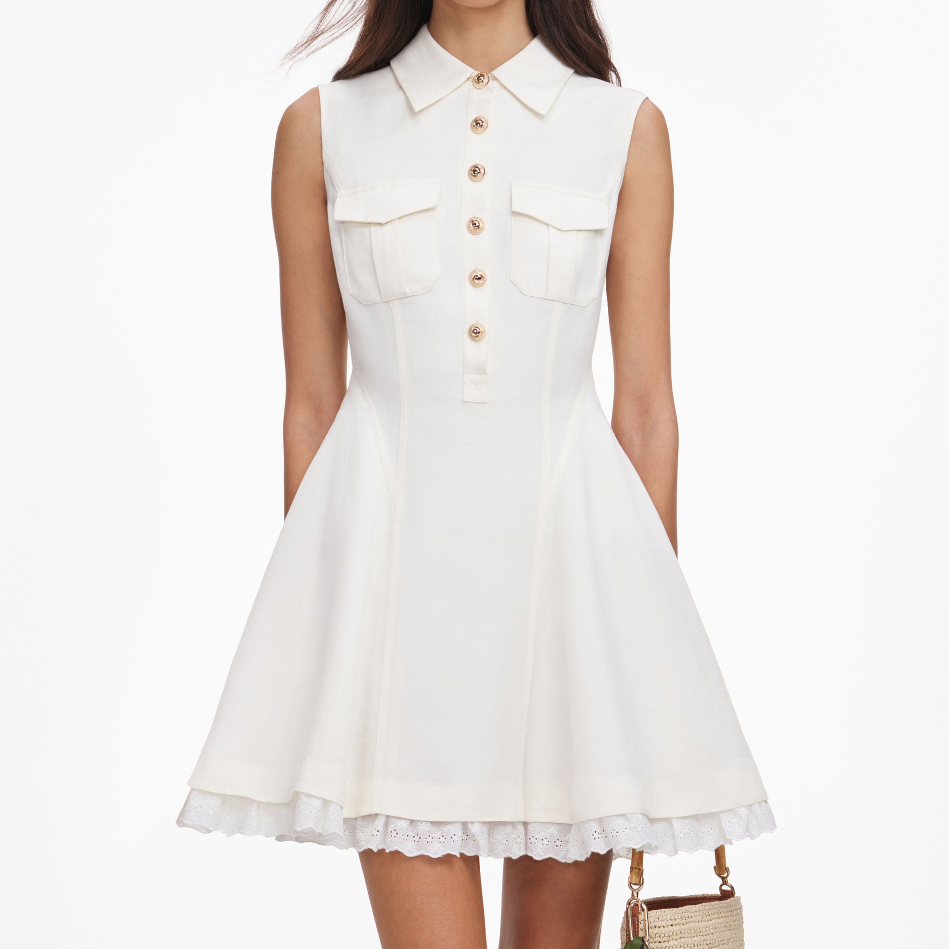 A close up of a woman wearing the Cream Linen Blend Sleeveless Mini Dress