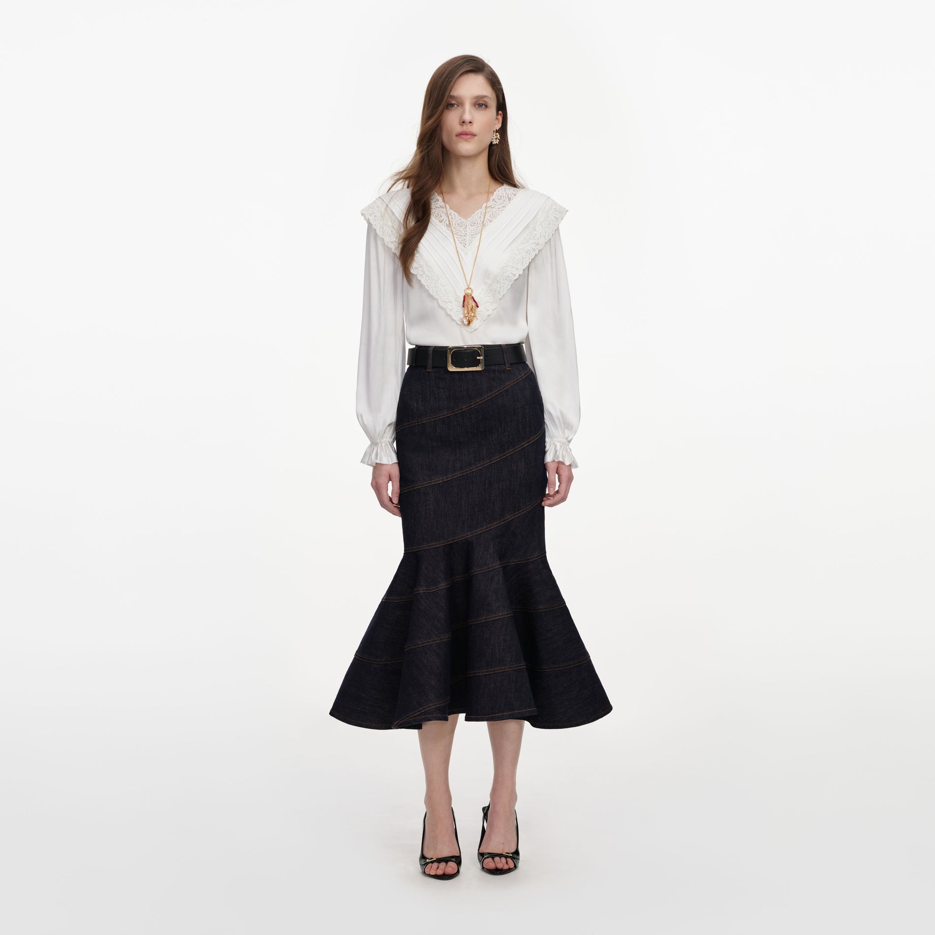 Front view of a woman wearing the Cream Viscose Lace Top