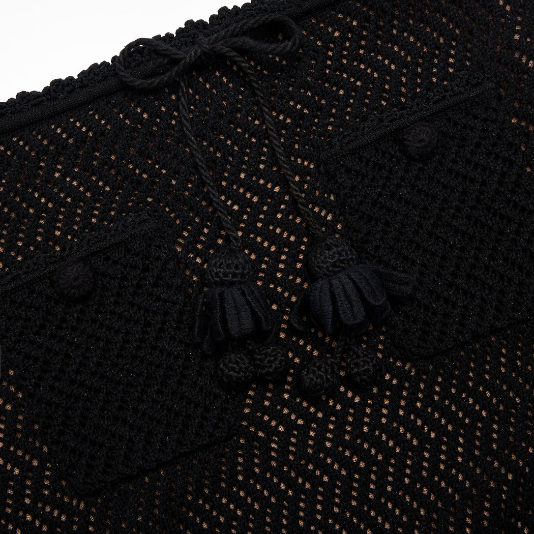 A close up of the fabric for the Black Crochet Knit Midi Skirt