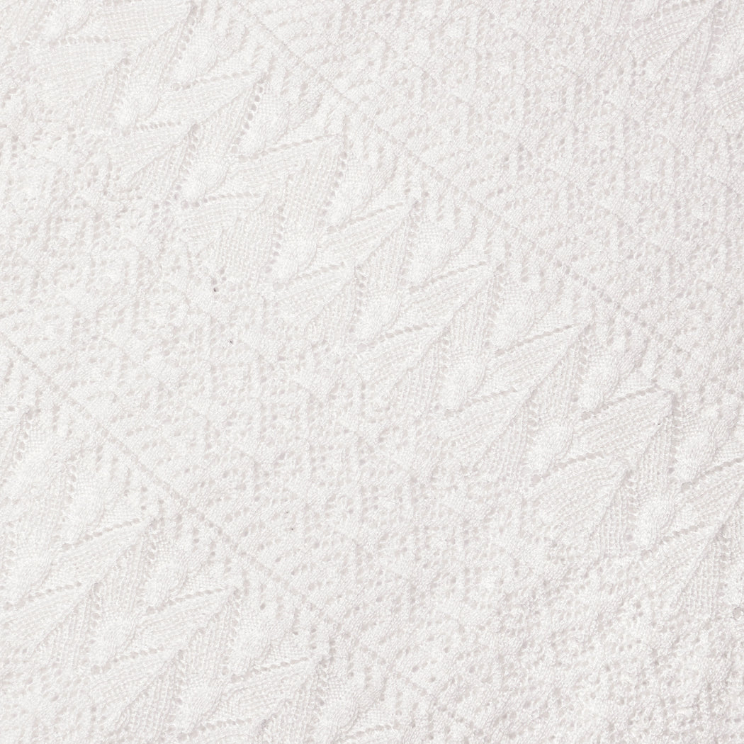A close up of the fabric for the White Pointelle Knit Midi Skirt