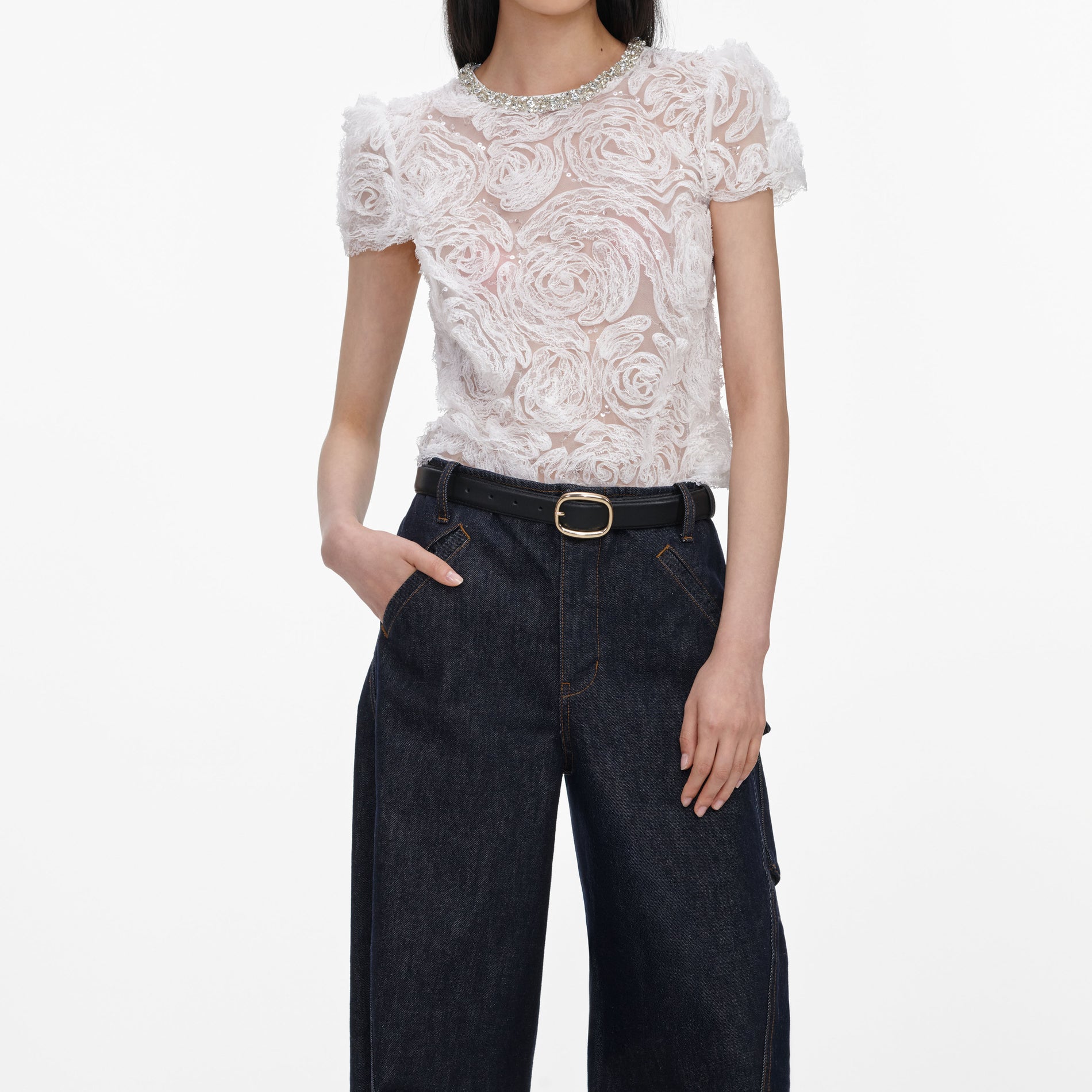 A close up of a woman wearing the White Tulle Lace Top