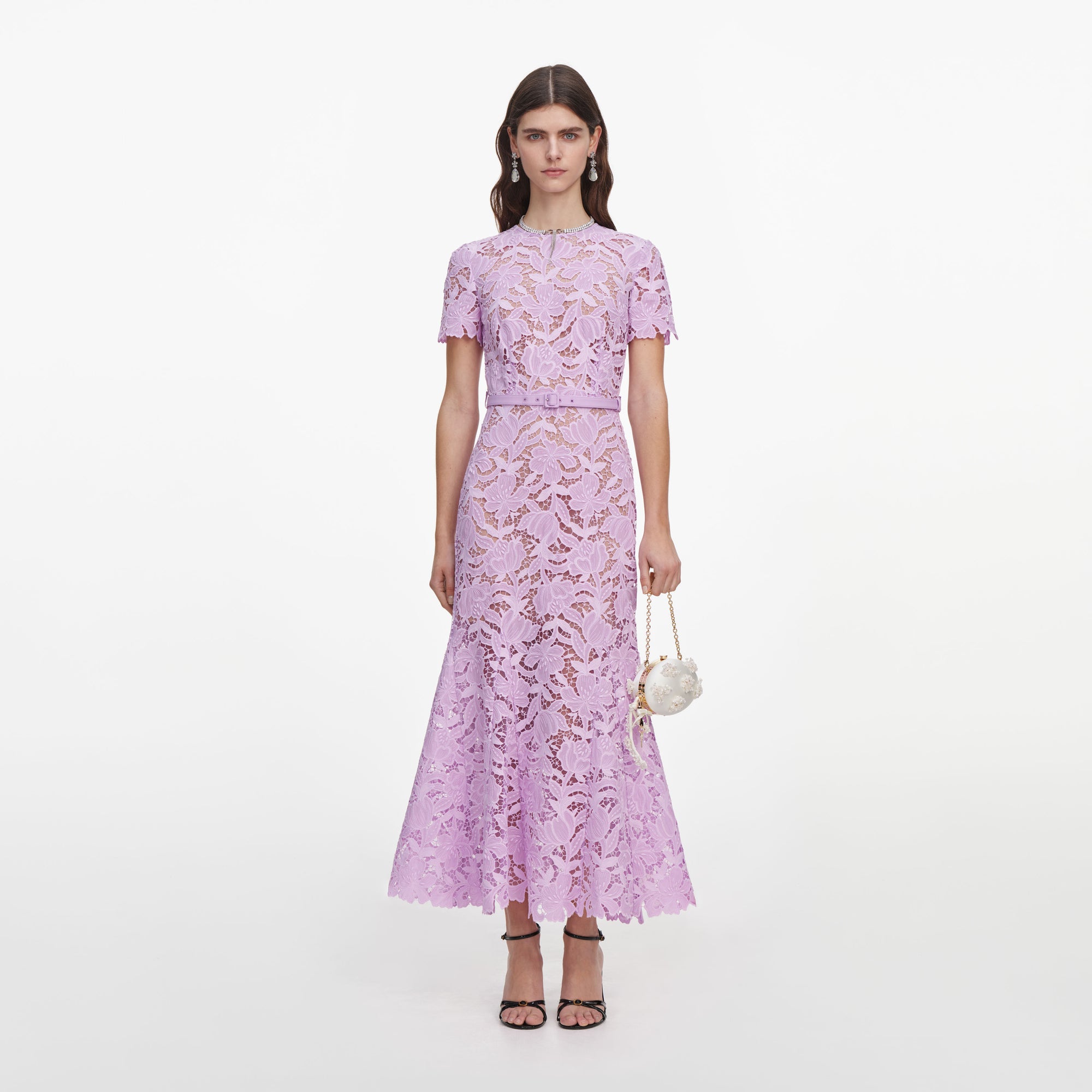 Front view of a woman wearing the Lilac Lace Midi Dress