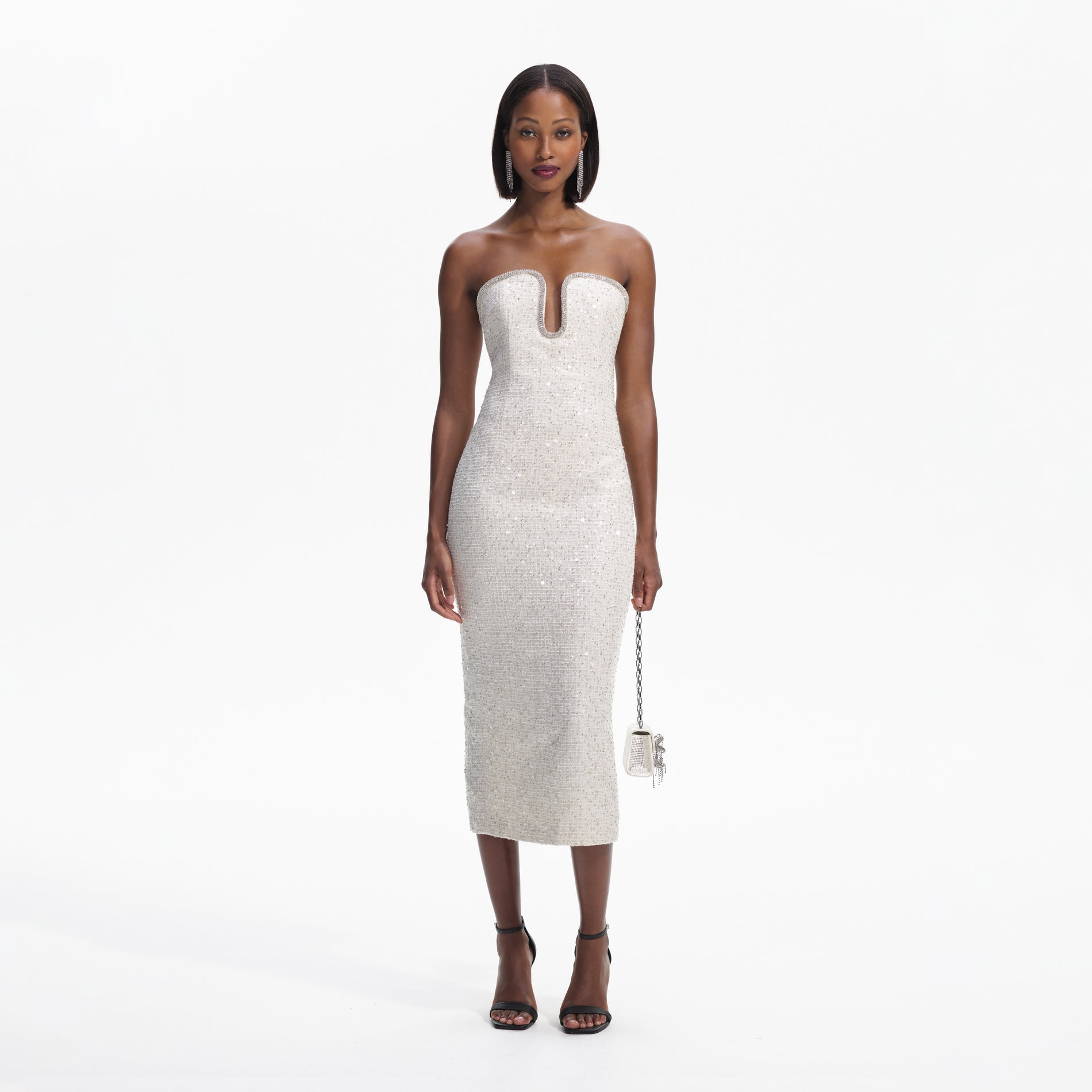 Front view of a woman wearing the Cream Sequin Boucle Strapless Midi Dress