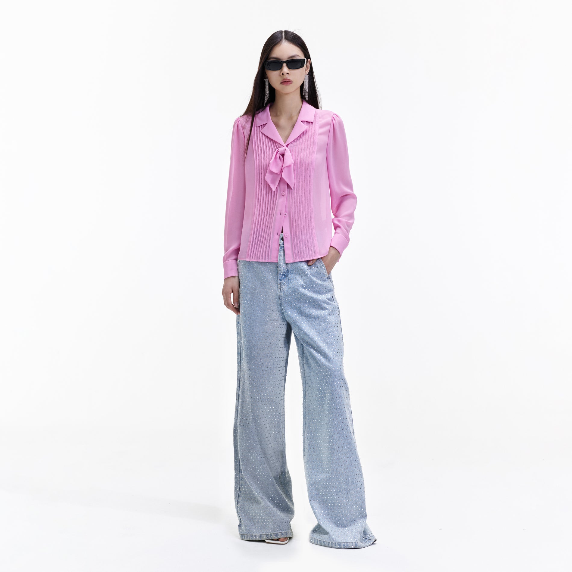 Front view of a woman wearing the Pink Chiffon Blouse