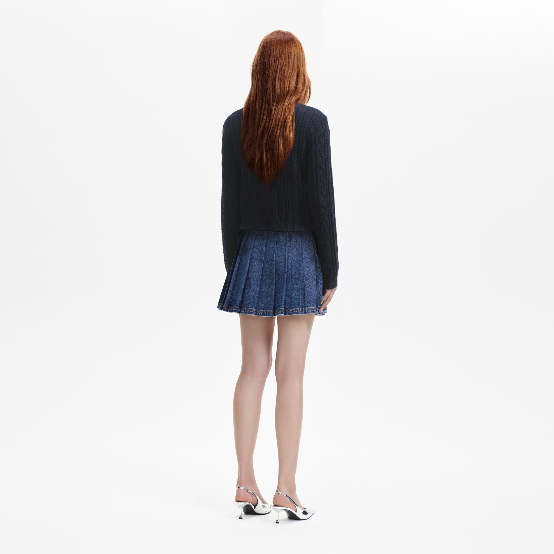 Back view of a woman wearing the Navy Knit Collar Cardigan