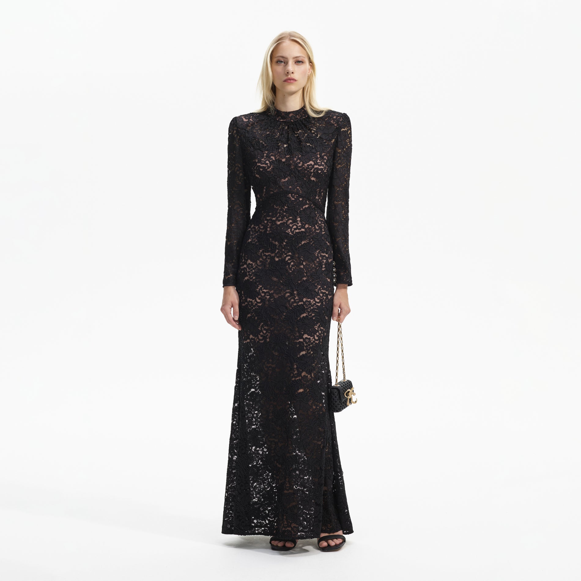 Front view of a woman wearing the Black Cord Lace Maxi Dress