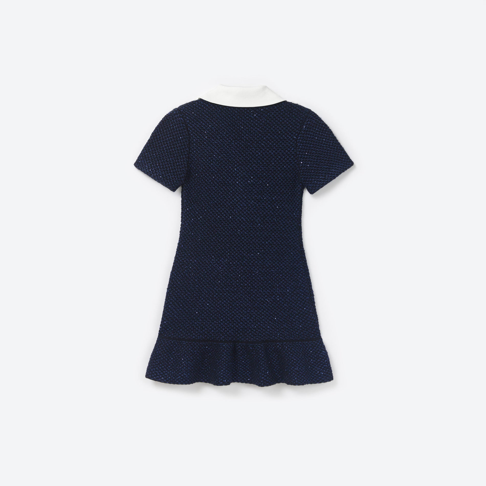 Side view of a woman wearing the Blue Sequin Knit Bow Dress