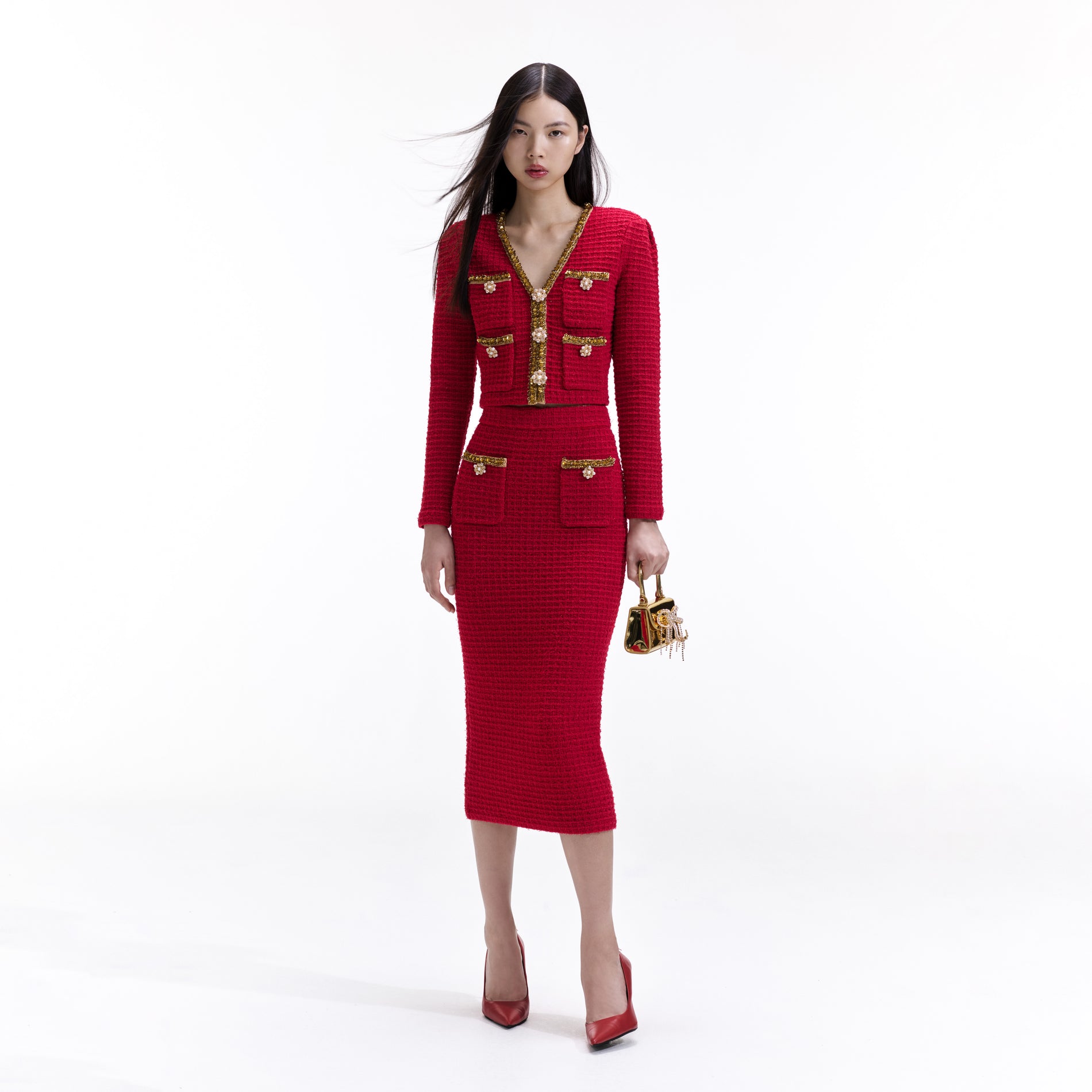 Front view of a woman wearing the Red Knit Midi Skirt