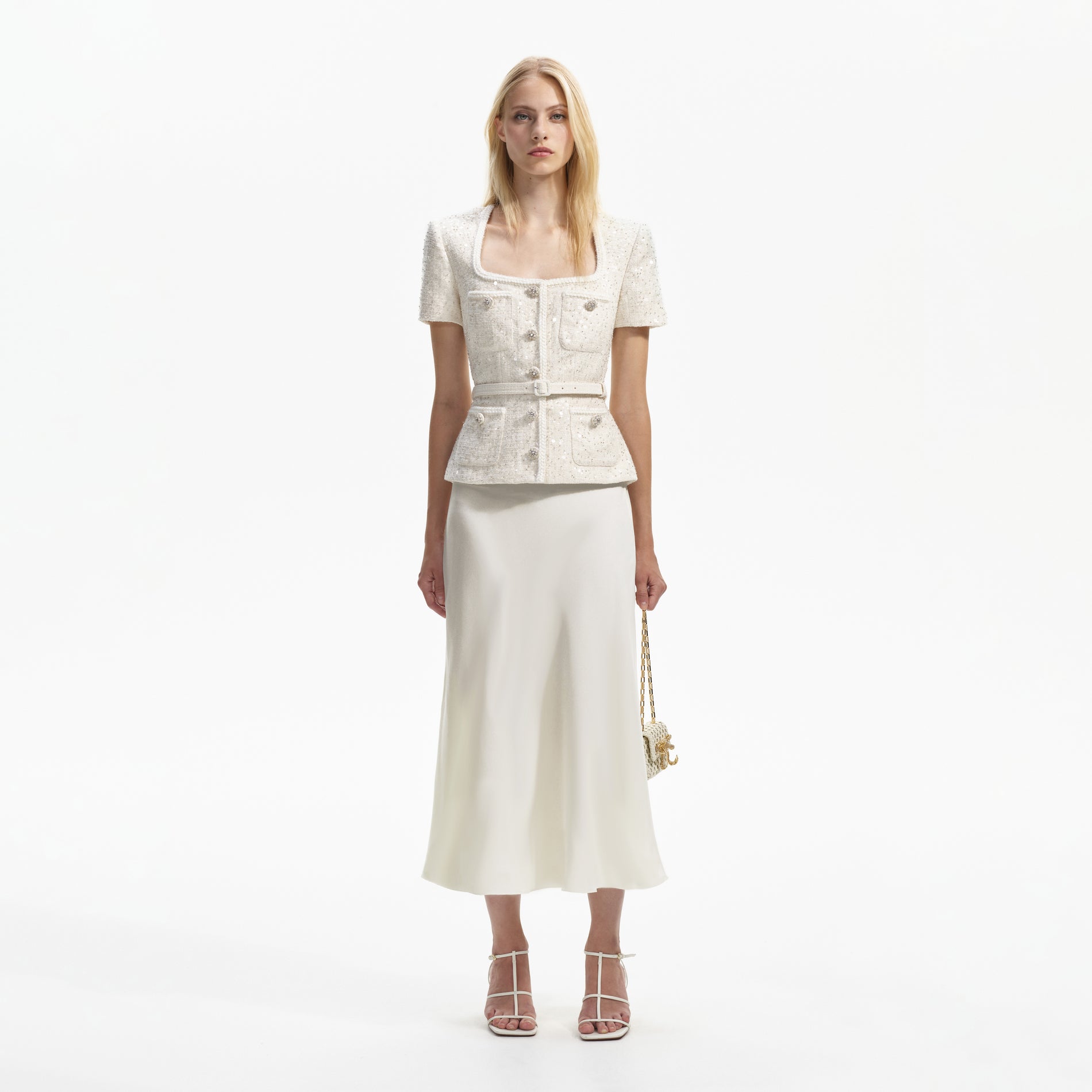 Front view of a woman wearing the Cream Sequin Boucle Midi Dress